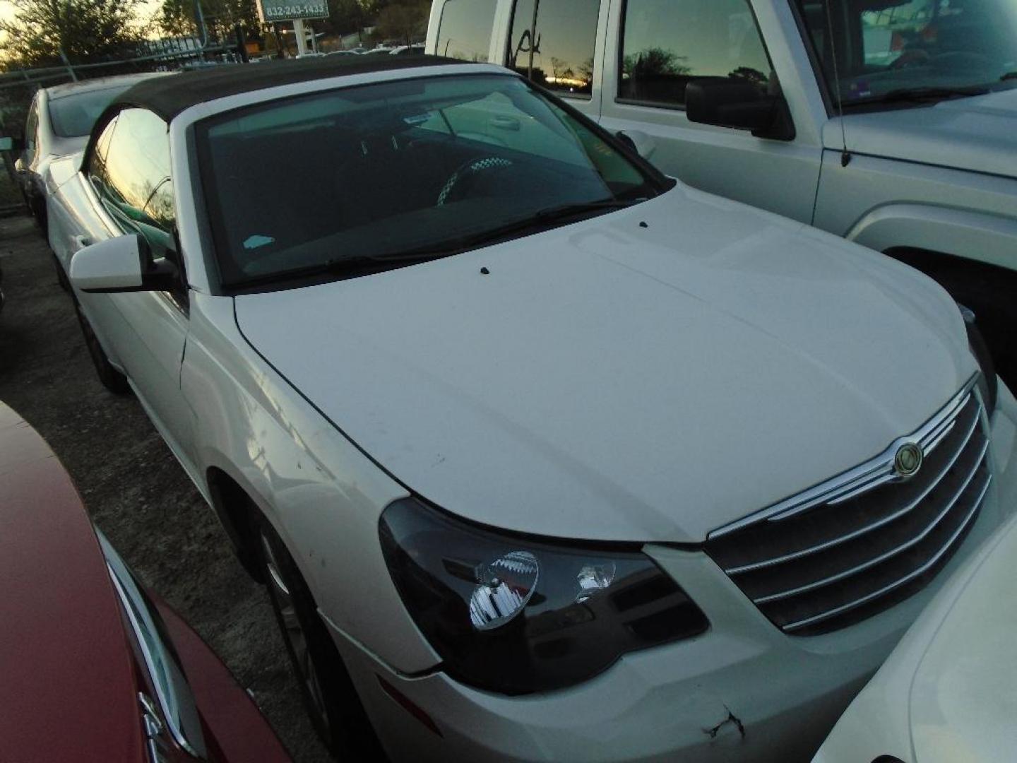 2010 WHITE CHRYSLER SEBRING Convertible Touring (1C3BC5ED1AN) with an 2.7L V6 DOHC 24V FFV engine, AUTOMATIC transmission, located at 2303 West Mt. Houston, Houston, Texas, 77038, (281) 507-3956, 29.771597, -95.339569 - Photo#3