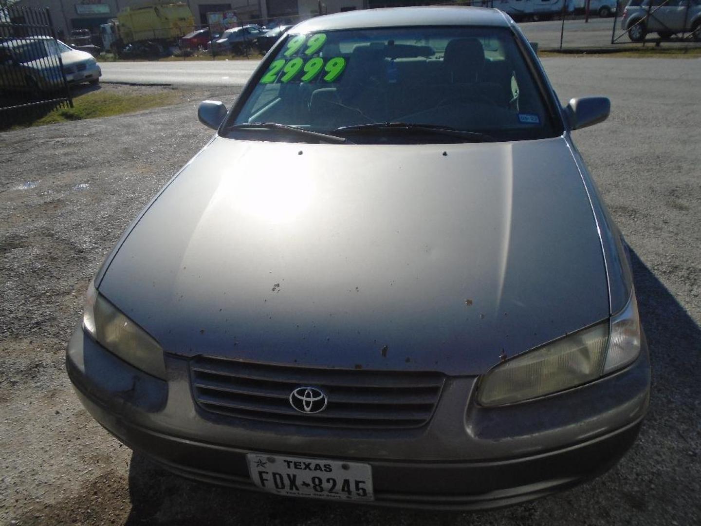 1999 TAN TOYOTA CAMRY CE (4T1BG22K8XU) with an 2.2L L4 DOHC 16V engine, AUTOMATIC transmission, located at 2303 West Mt. Houston, Houston, 77038, (281) 507-3956, 29.771597, -95.339569 - Photo#1