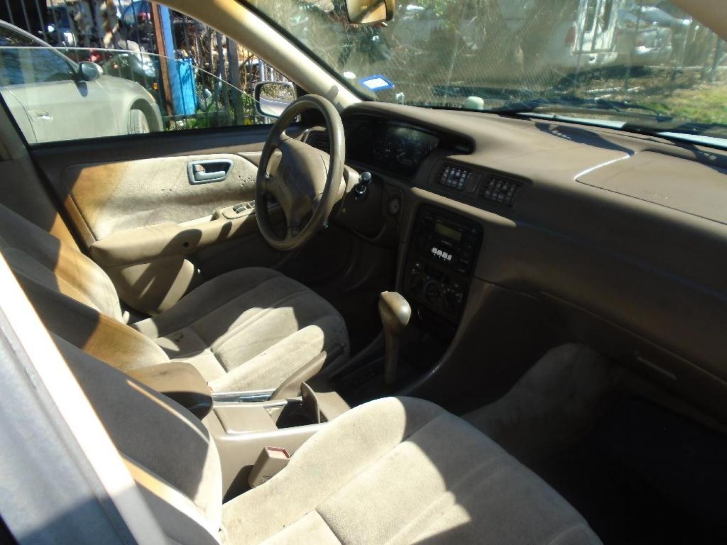 1999 TAN TOYOTA CAMRY CE (4T1BG22K9XU) with an 2.2L L4 DOHC 16V engine, AUTOMATIC transmission, located at 2303 West Mt. Houston, Houston, 77038, (281) 507-3956, 29.771597, -95.339569 - Photo#5