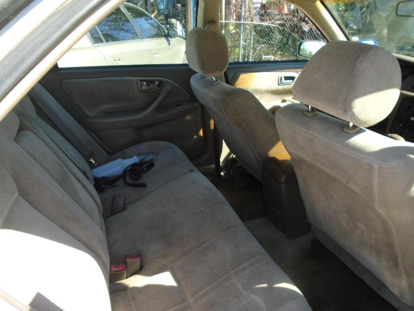 1999 TAN TOYOTA CAMRY CE (4T1BG22K9XU) with an 2.2L L4 DOHC 16V engine, AUTOMATIC transmission, located at 2303 West Mt. Houston, Houston, 77038, (281) 507-3956, 29.771597, -95.339569 - Photo#6