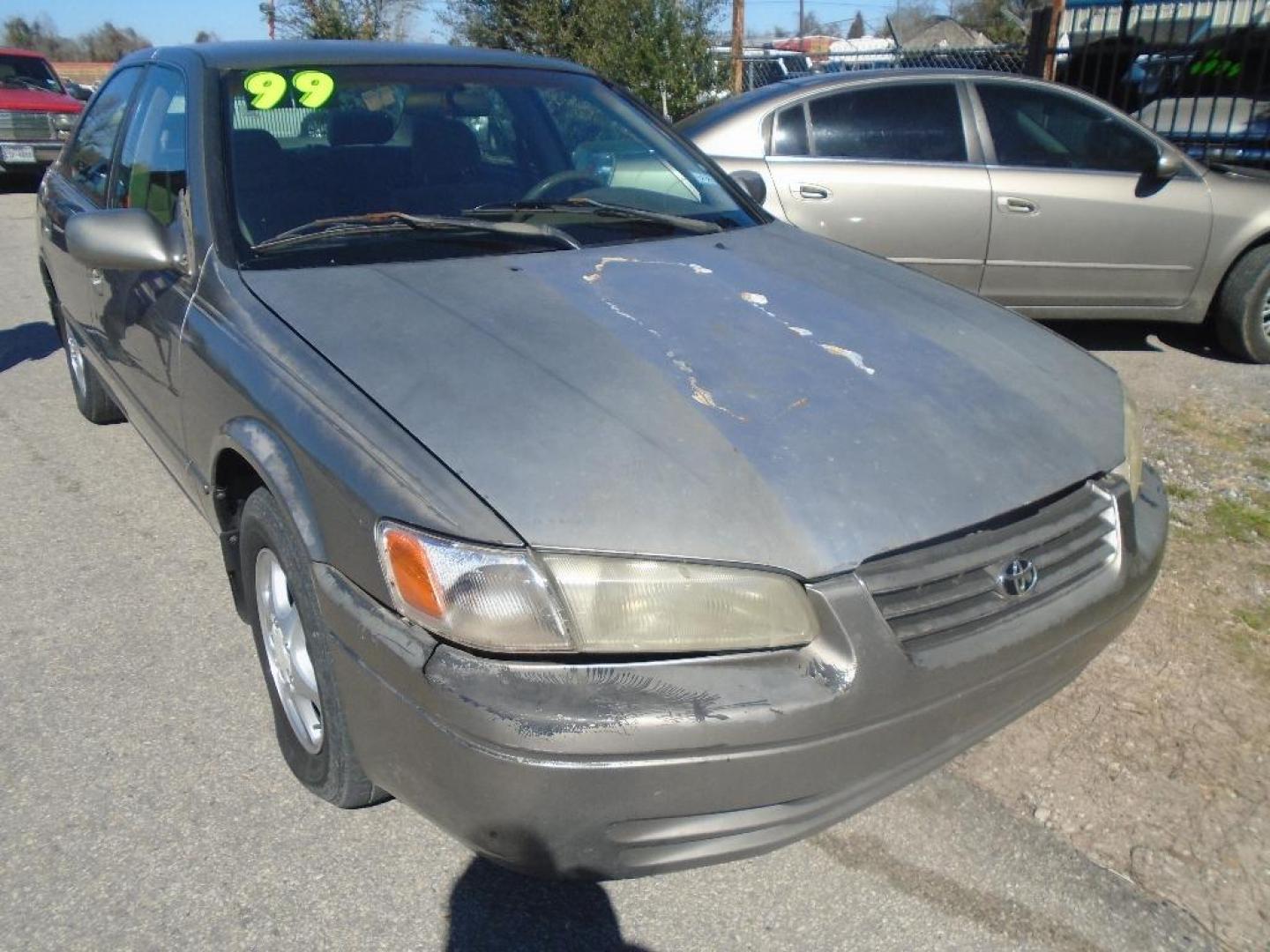 1999 TAN TOYOTA CAMRY CE (4T1BG22K9XU) with an 2.2L L4 DOHC 16V engine, AUTOMATIC transmission, located at 2303 West Mt. Houston, Houston, 77038, (281) 507-3956, 29.771597, -95.339569 - Photo#1