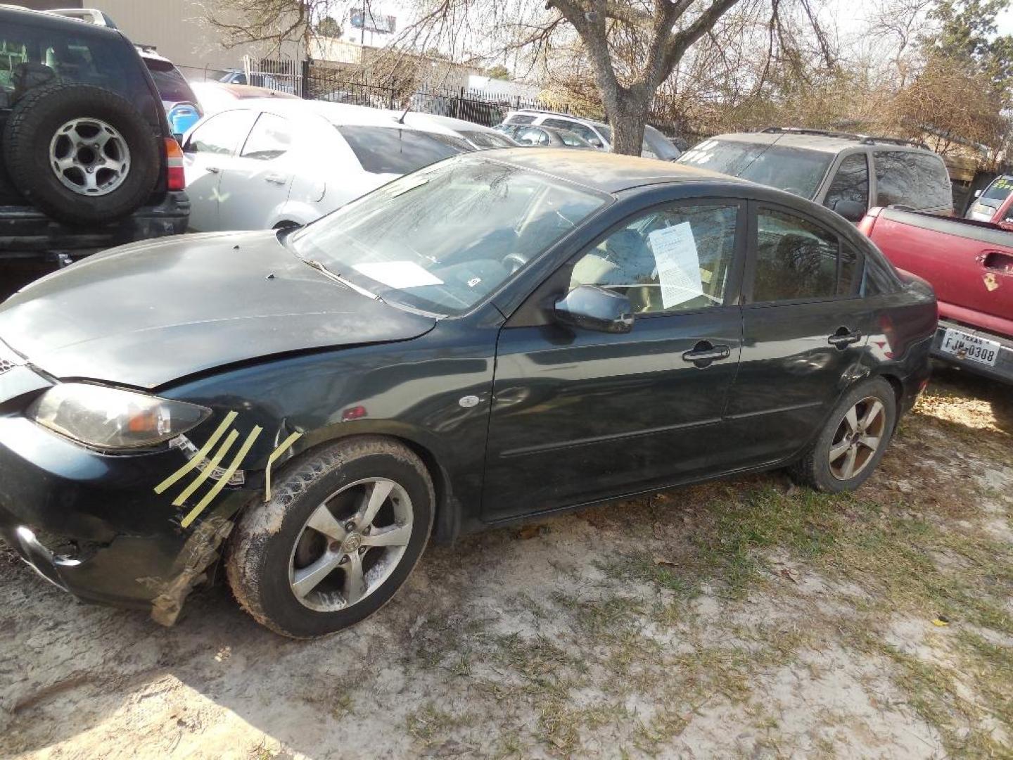 2004 BLACK MAZDA MAZDA3 i 4-door (JM1BK12F341) with an 2.0L L4 DOHC 16V engine, AUTOMATIC transmission, located at 2303 West Mt. Houston, Houston, 77038, (281) 507-3956, 29.771597, -95.339569 - Photo#1