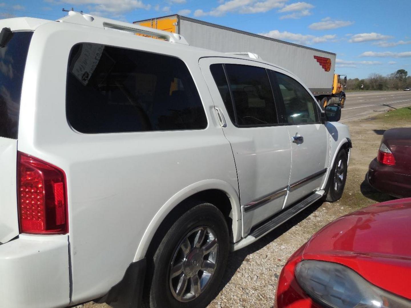 2004 WHITE INFINITI QX56 2WD (5N3AA08A64N) with an 5.6L V8 DOHC 32V engine, AUTOMATIC transmission, located at 2303 West Mt. Houston, Houston, 77038, (281) 507-3956, 29.771597, -95.339569 - Photo#7