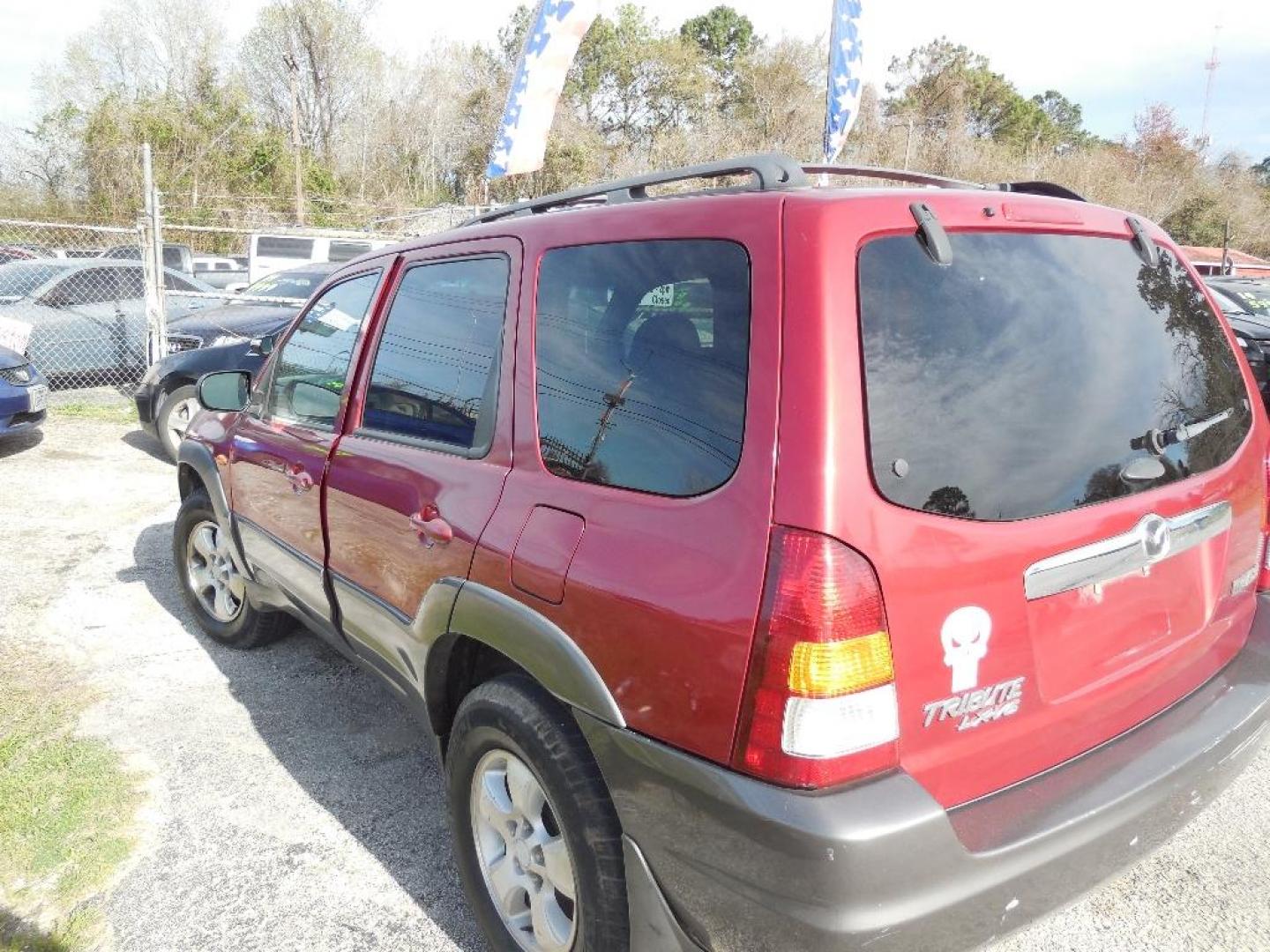 2003 RED MAZDA TRIBUTE LX (4F2YZ04153K) with an 3.0L V6 DOHC 24V engine, AUTOMATIC transmission, located at 2303 West Mt. Houston, Houston, 77038, (281) 507-3956, 29.771597, -95.339569 - Photo#5