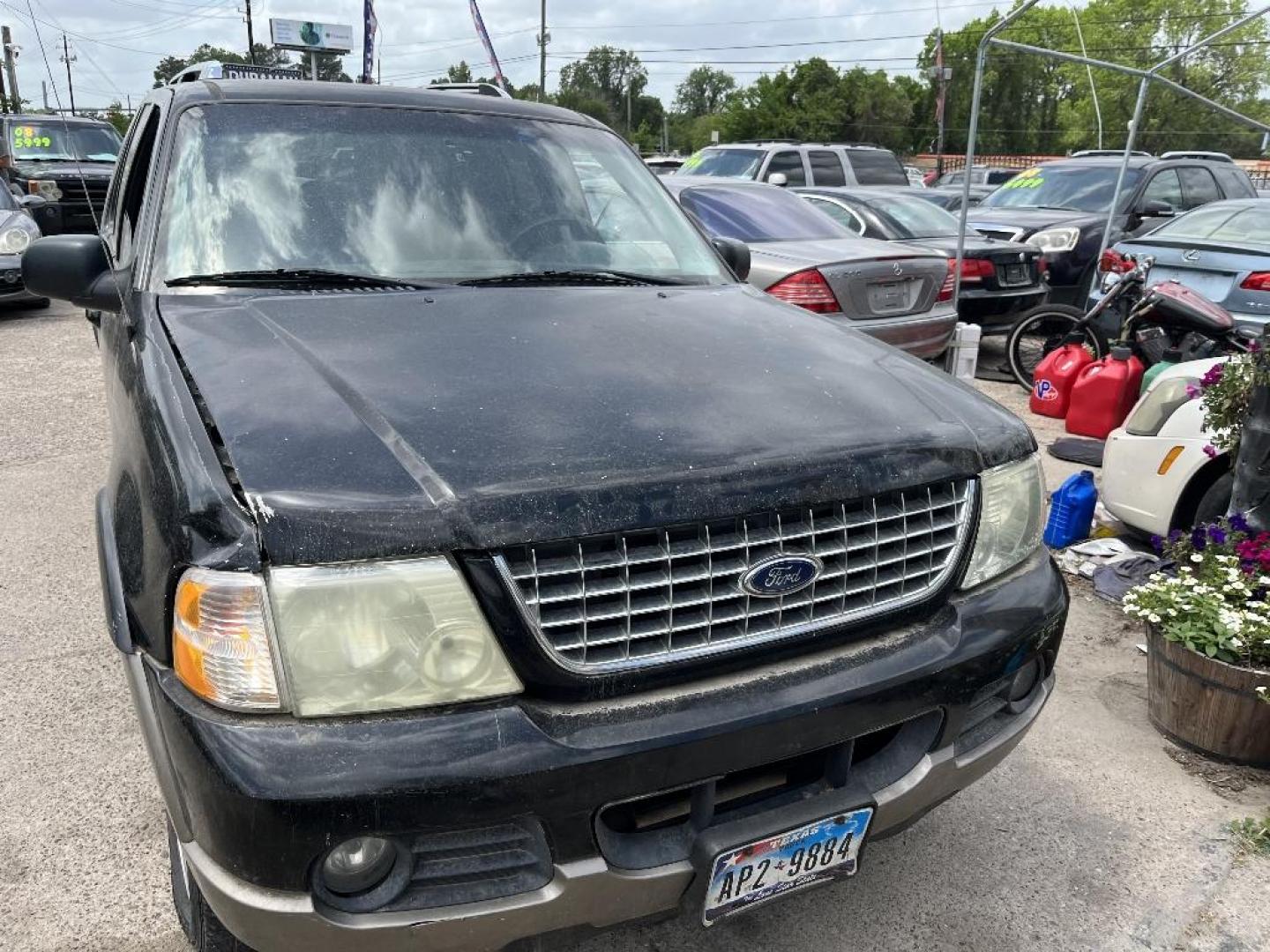 2004 BLACK FORD EXPLORER Limited 4.0L 2WD (1FMZU65K34U) with an 4.0L V6 SOHC 12V FFV engine, AUTOMATIC transmission, located at 2303 West Mt. Houston, Houston, 77038, (281) 507-3956, 29.771597, -95.339569 - Photo#1