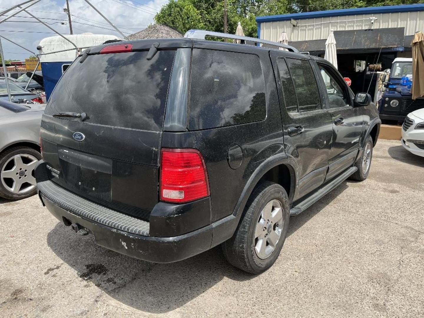 2004 BLACK FORD EXPLORER Limited 4.0L 2WD (1FMZU65K34U) with an 4.0L V6 SOHC 12V FFV engine, AUTOMATIC transmission, located at 2303 West Mt. Houston, Houston, 77038, (281) 507-3956, 29.771597, -95.339569 - Photo#2