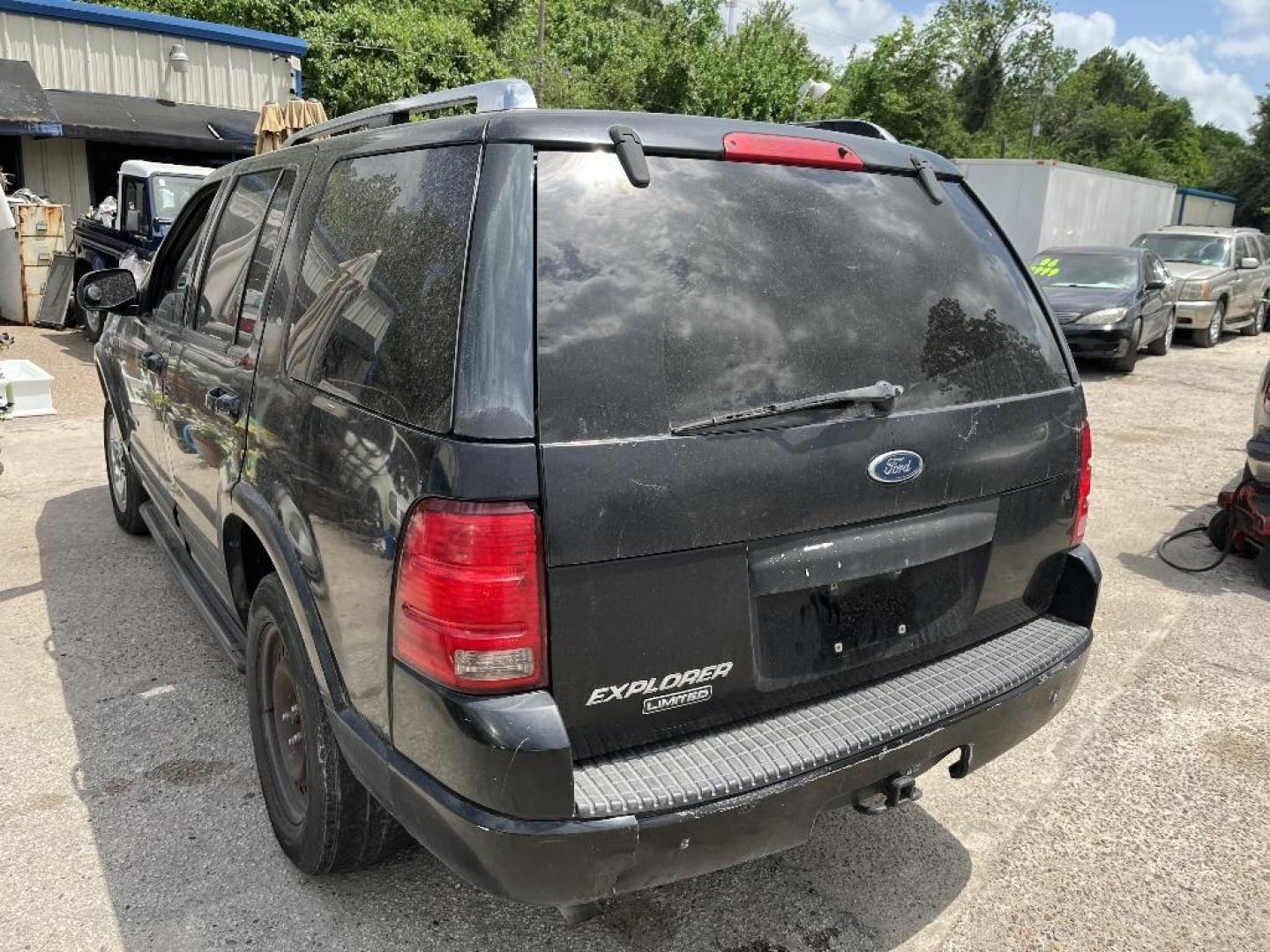 2004 BLACK FORD EXPLORER Limited 4.0L 2WD (1FMZU65K34U) with an 4.0L V6 SOHC 12V FFV engine, AUTOMATIC transmission, located at 2303 West Mt. Houston, Houston, 77038, (281) 507-3956, 29.771597, -95.339569 - Photo#3