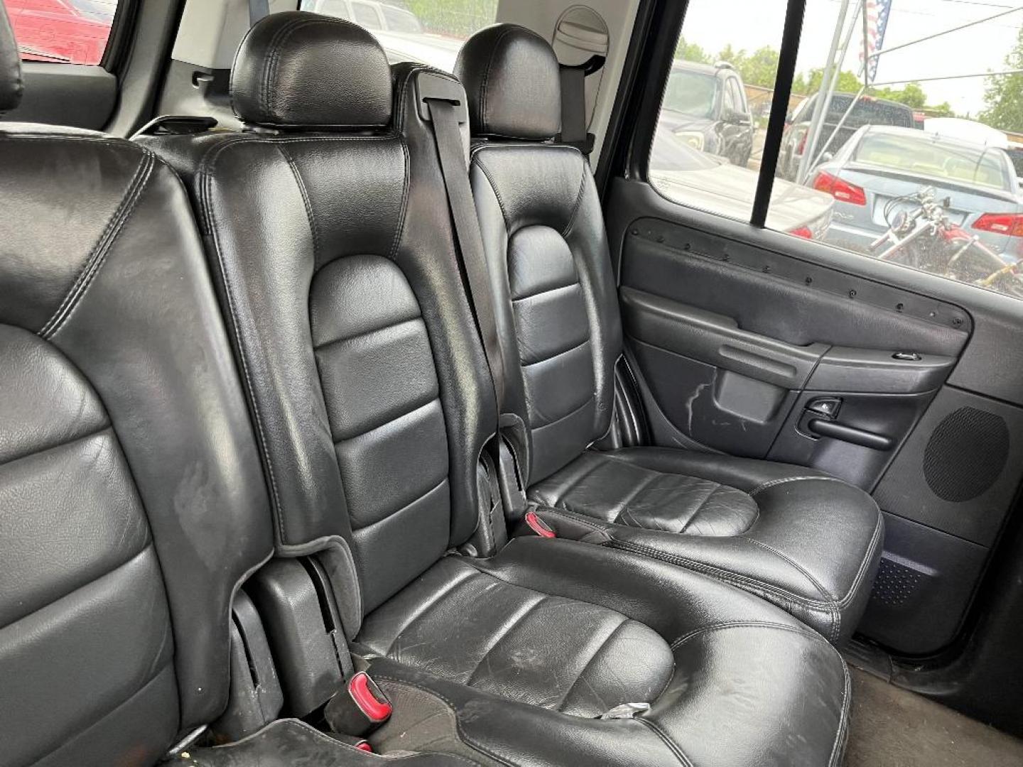 2004 BLACK FORD EXPLORER Limited 4.0L 2WD (1FMZU65K34U) with an 4.0L V6 SOHC 12V FFV engine, AUTOMATIC transmission, located at 2303 West Mt. Houston, Houston, 77038, (281) 507-3956, 29.771597, -95.339569 - Photo#6