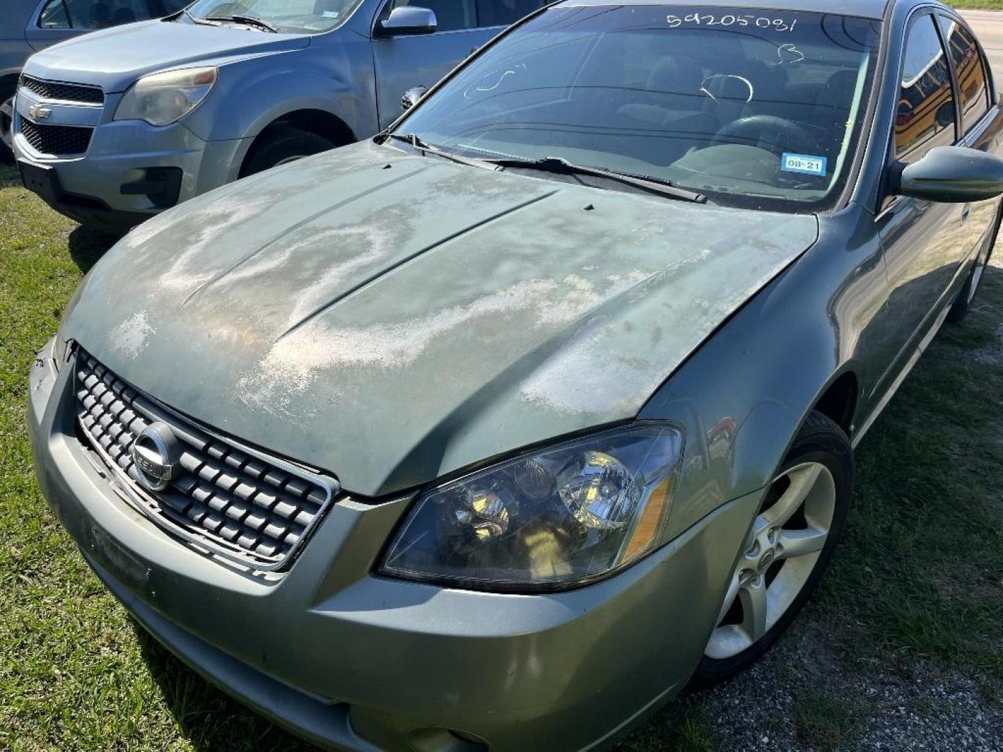 2005 GREEN NISSAN ALTIMA SE-R (1N4BL11D85C) with an 3.5L V6 DOHC 24V engine, AUTOMATIC transmission, located at 2303 West Mt. Houston, Houston, 77038, (281) 507-3956, 29.771597, -95.339569 - Photo#0