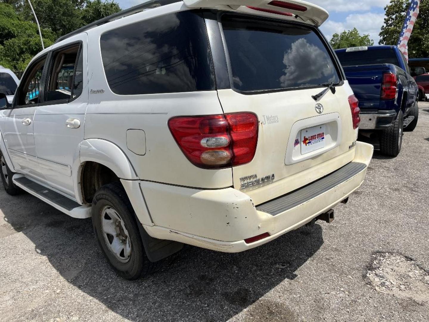 2004 WHITE TOYOTA SEQUOIA Limited 2WD (5TDZT38A24S) with an 4.7L V8 DOHC 32V engine, AUTOMATIC transmission, located at 2303 West Mt. Houston, Houston, 77038, (281) 507-3956, 29.771597, -95.339569 - Photo#3