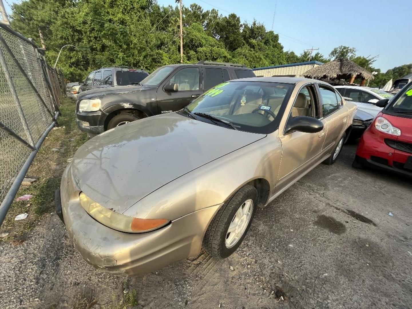 2003 BROWN OLDSMOBILE ALERO GL1 Sedan (1G3NL52F43C) with an 2.2L L4 DOHC 16V engine, AUTOMATIC transmission, located at 2303 West Mt. Houston, Houston, 77038, (281) 507-3956, 29.771597, -95.339569 - Photo#0