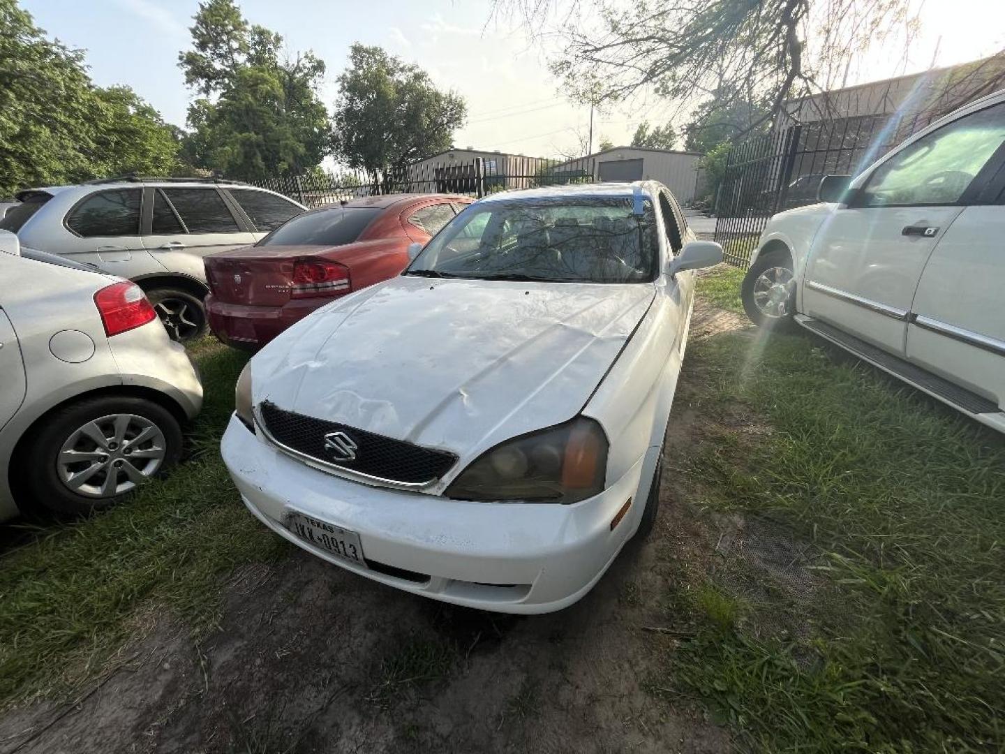 2005 WHITE SUZUKI VERONA EX (KL5VM56L15B) with an 2.5L L6 DOHC 24V engine, AUTOMATIC transmission, located at 2303 West Mt. Houston, Houston, 77038, (281) 507-3956, 29.771597, -95.339569 - Photo#0