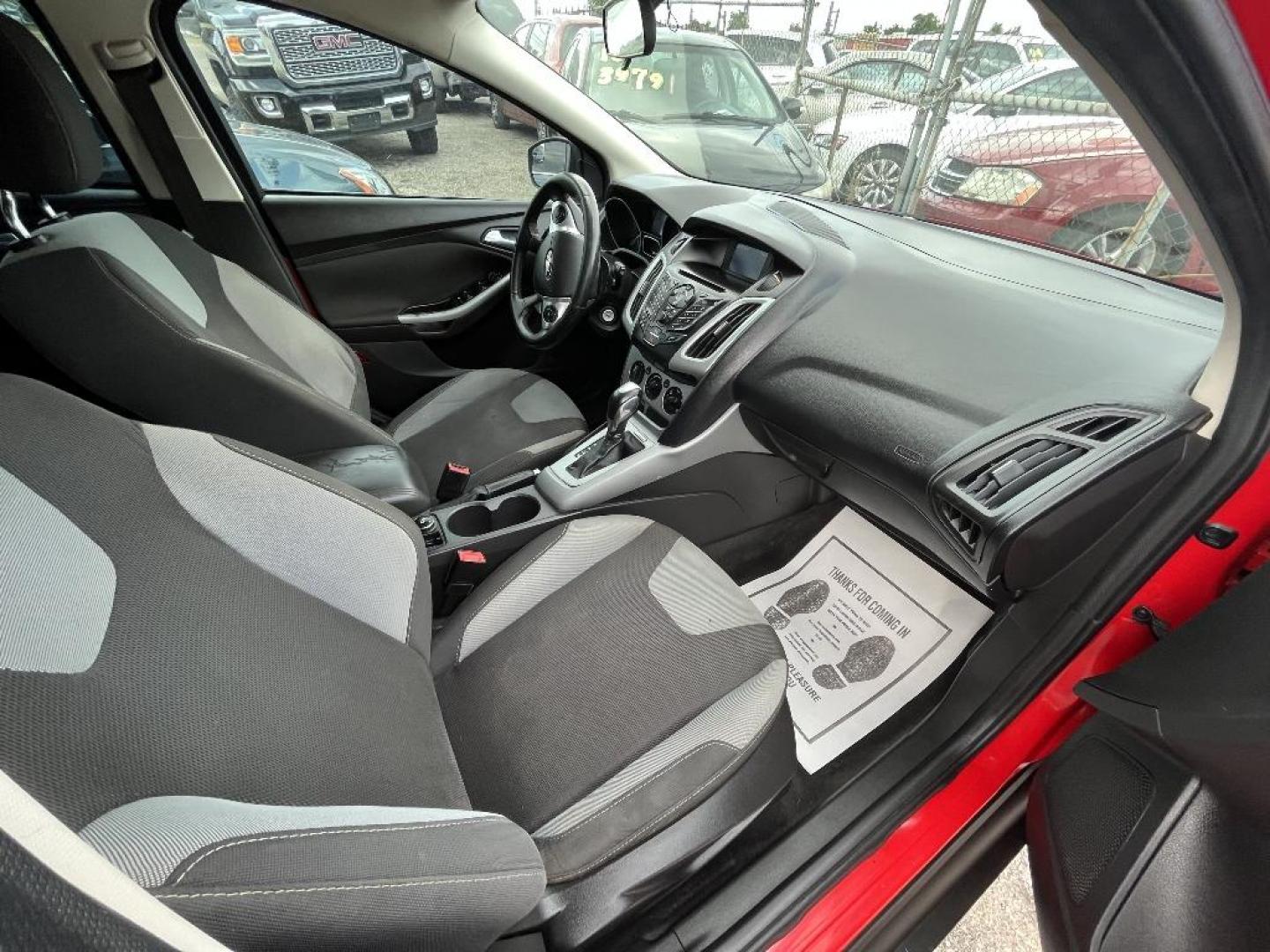 2012 RED FORD FOCUS SE (1FAHP3K25CL) with an 2.0L L4 DOHC 16V engine, AUTOMATIC transmission, located at 2303 West Mt. Houston, Houston, 77038, (281) 507-3956, 29.771597, -95.339569 - Photo#4