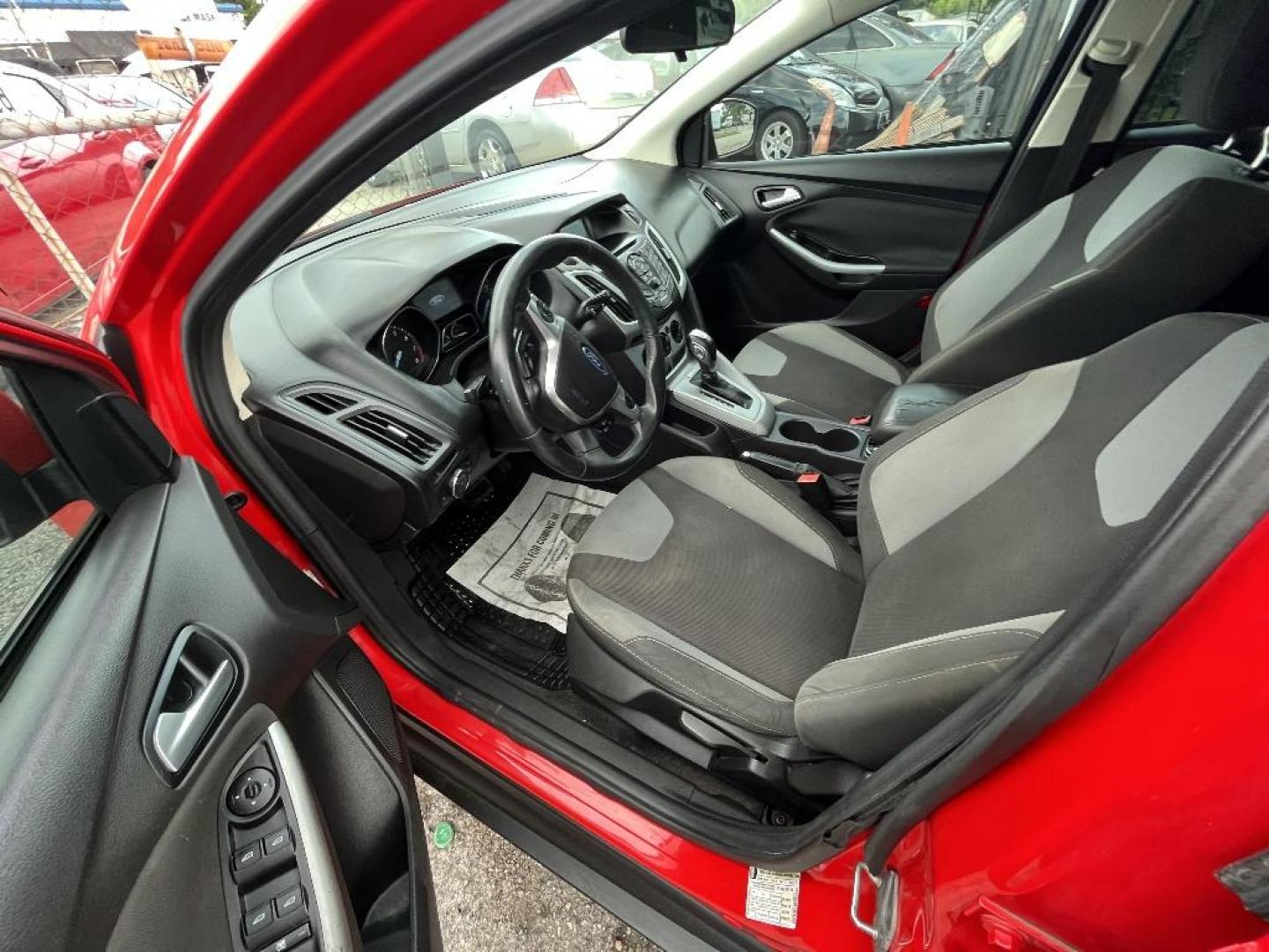 2012 RED FORD FOCUS SE (1FAHP3K25CL) with an 2.0L L4 DOHC 16V engine, AUTOMATIC transmission, located at 2303 West Mt. Houston, Houston, 77038, (281) 507-3956, 29.771597, -95.339569 - Photo#3