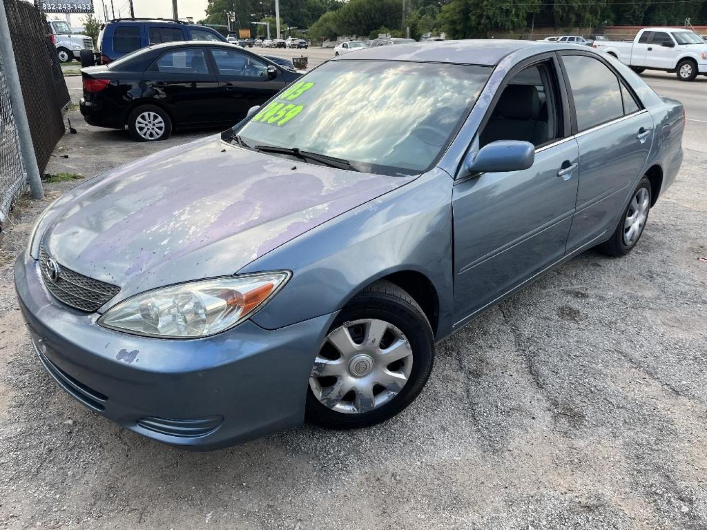 2003 BLUE TOYOTA CAMRY LE (4T1BE30K03U) with an 2.4L L4 DOHC 16V engine, AUTOMATIC transmission, located at 2303 West Mt. Houston, Houston, 77038, (281) 507-3956, 29.771597, -95.339569 - Photo#2