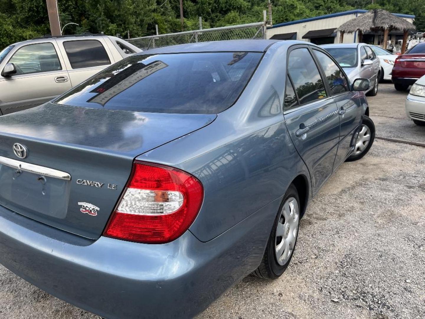 2003 BLUE TOYOTA CAMRY LE (4T1BE30K03U) with an 2.4L L4 DOHC 16V engine, AUTOMATIC transmission, located at 2303 West Mt. Houston, Houston, 77038, (281) 507-3956, 29.771597, -95.339569 - Photo#3