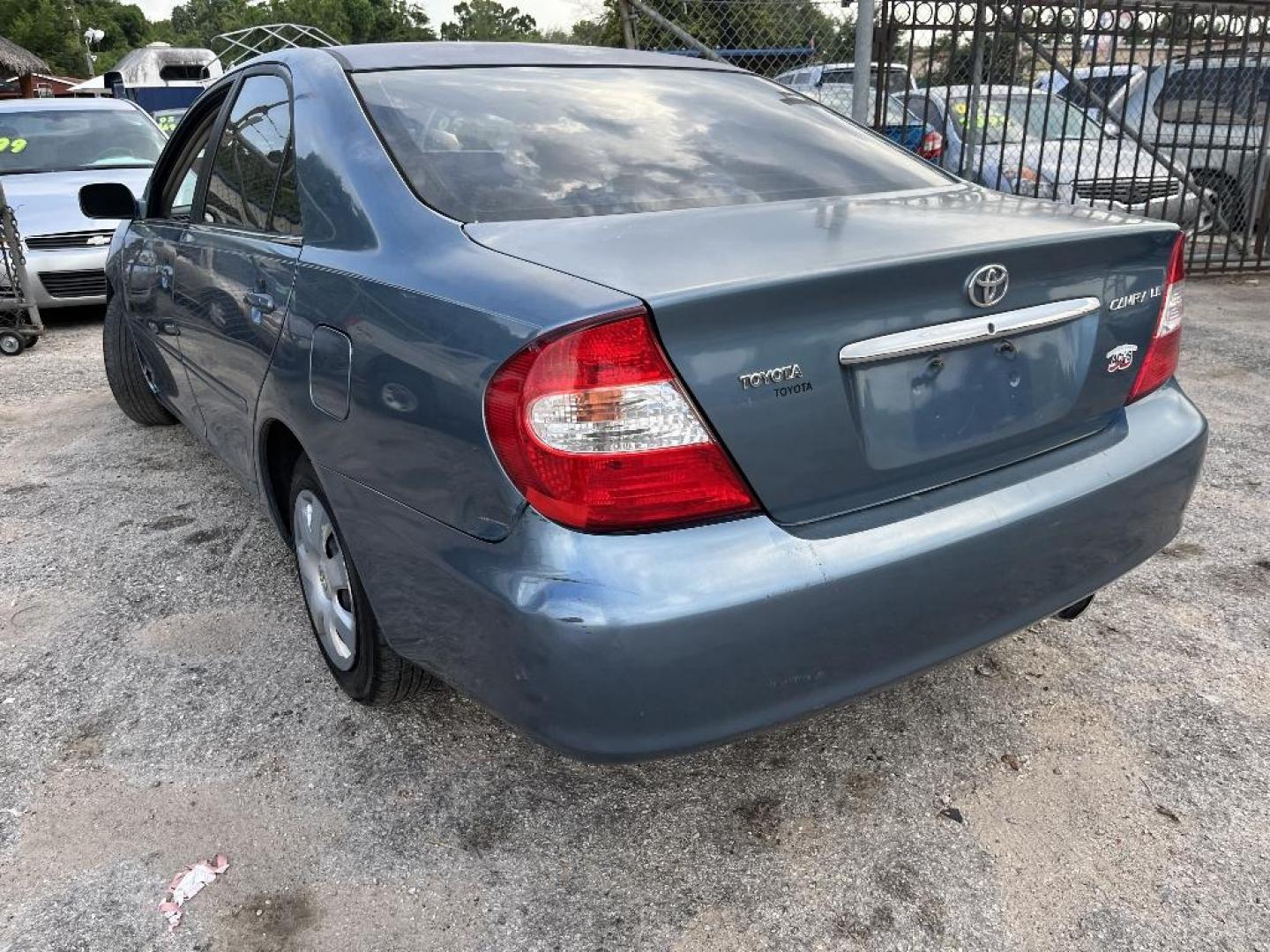 2003 BLUE TOYOTA CAMRY LE (4T1BE30K03U) with an 2.4L L4 DOHC 16V engine, AUTOMATIC transmission, located at 2303 West Mt. Houston, Houston, 77038, (281) 507-3956, 29.771597, -95.339569 - Photo#4