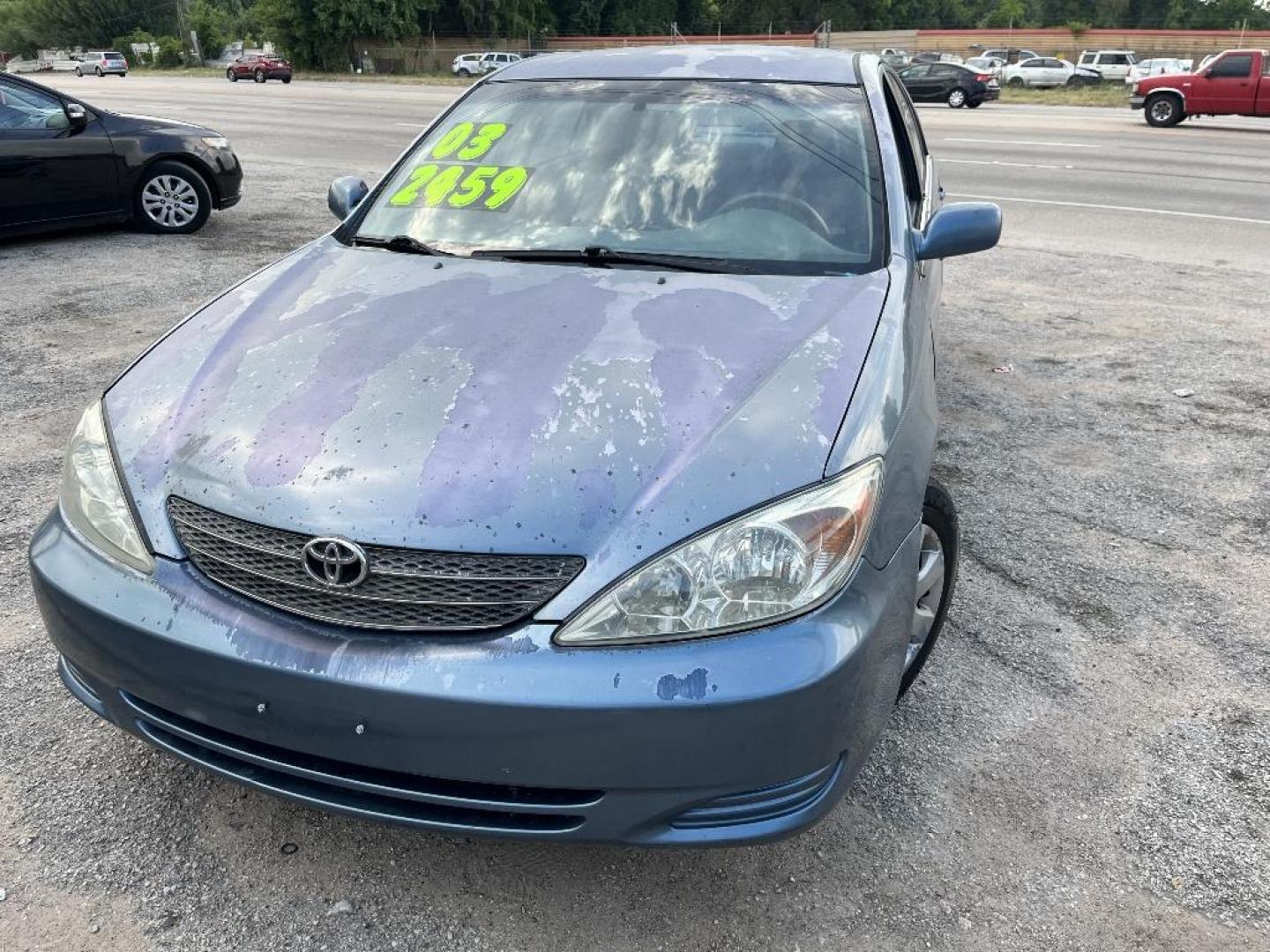 2003 BLUE TOYOTA CAMRY LE (4T1BE30K03U) with an 2.4L L4 DOHC 16V engine, AUTOMATIC transmission, located at 2303 West Mt. Houston, Houston, 77038, (281) 507-3956, 29.771597, -95.339569 - Photo#1