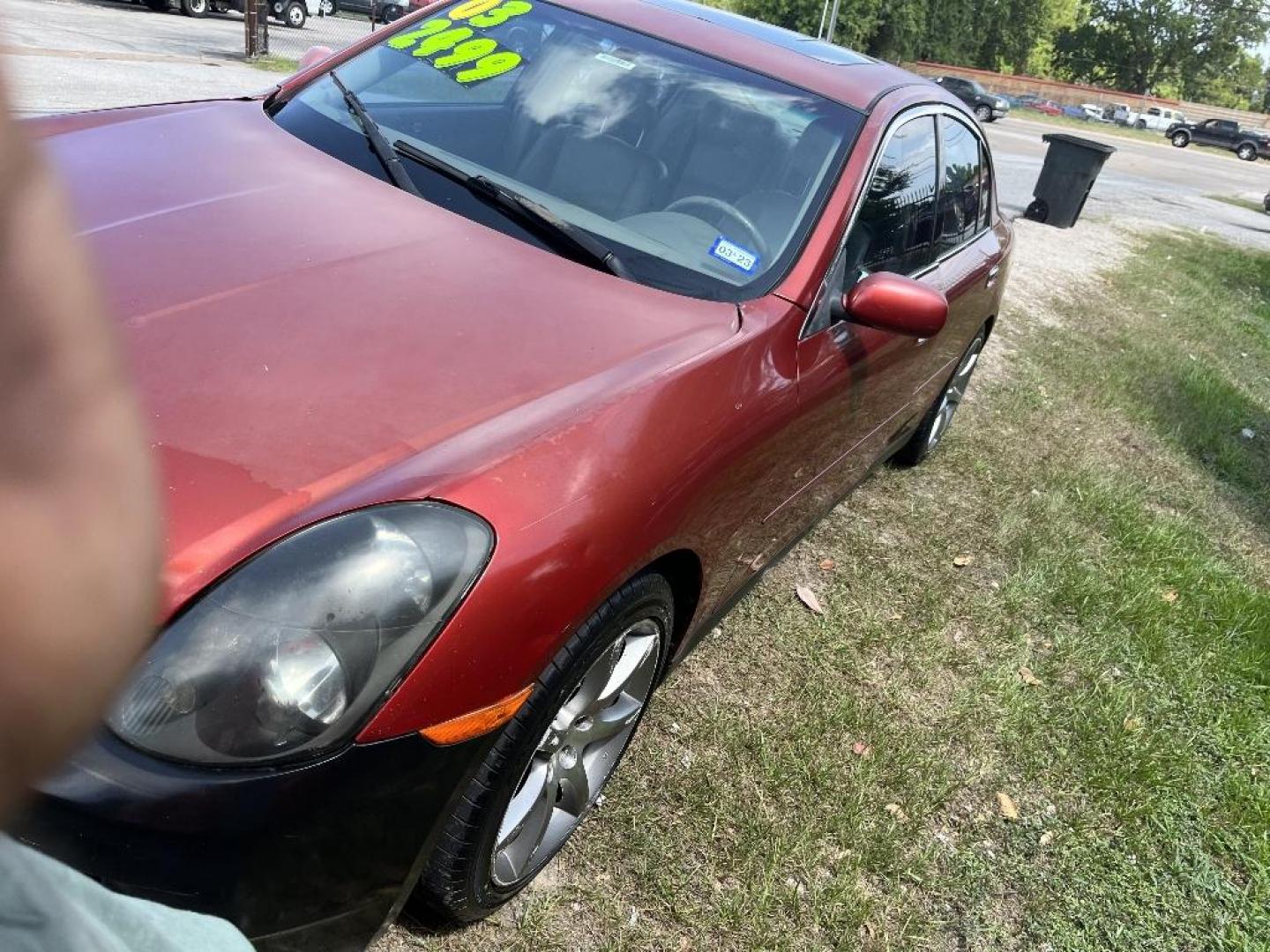 2003 RED INFINITI G35 Sport Sedan (JNKCV51E23M) with an 3.5L V6 DOHC 24V engine, AUTOMATIC transmission, located at 2303 West Mt. Houston, Houston, 77038, (281) 507-3956, 29.771597, -95.339569 - Photo#4