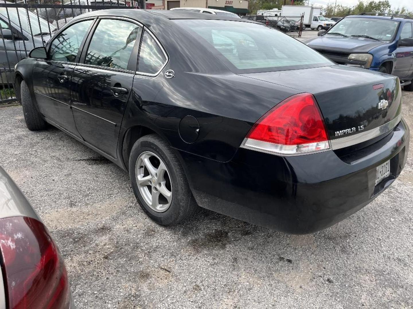 2006 BLACK CHEVROLET IMPALA LS (2G1WB55K069) with an 3.5L V6 OHV 16V FFV engine, AUTOMATIC transmission, located at 2303 West Mt. Houston, Houston, 77038, (281) 507-3956, 29.771597, -95.339569 - Photo#2