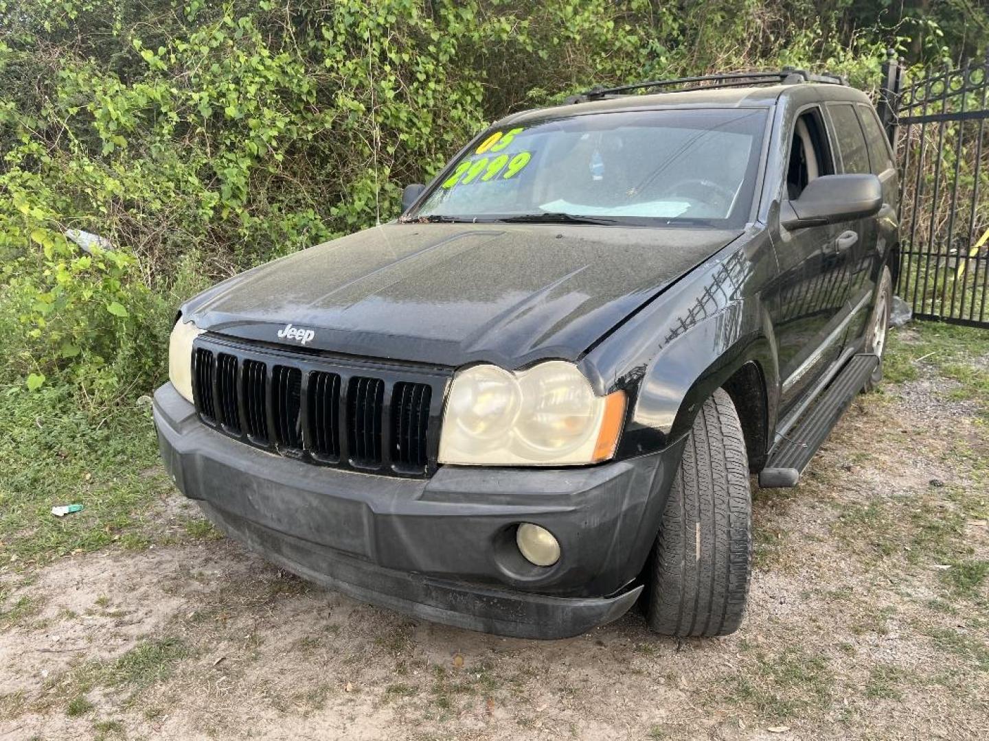 2005 BLACK JEEP GRAND CHEROKEE Laredo 4WD (1J4GR48K25C) with an 3.7L V6 SOHC 12V engine, AUTOMATIC transmission, located at 2303 West Mt. Houston, Houston, 77038, (281) 507-3956, 29.771597, -95.339569 - Photo#0