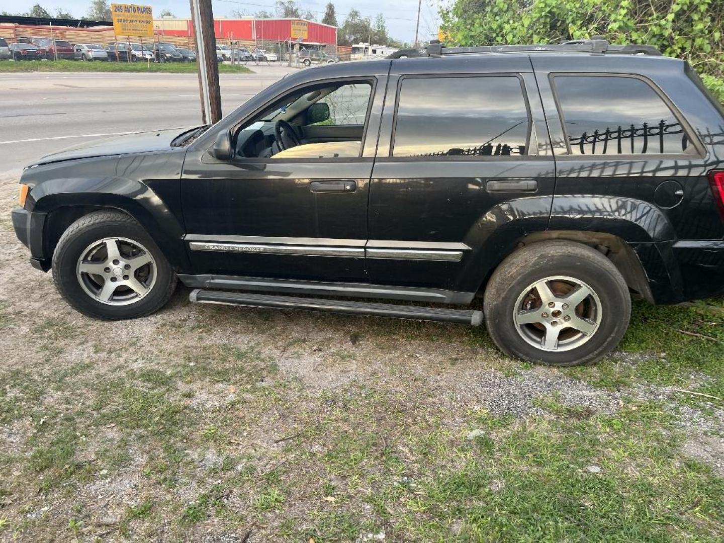 2005 BLACK JEEP GRAND CHEROKEE Laredo 4WD (1J4GR48K25C) with an 3.7L V6 SOHC 12V engine, AUTOMATIC transmission, located at 2303 West Mt. Houston, Houston, 77038, (281) 507-3956, 29.771597, -95.339569 - Photo#2