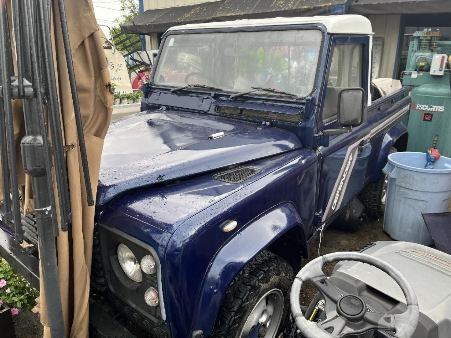 1986 BLUE LAND ROVER DEFENDER (SALLDVAD7AA) with an 4 engine, MANUAL transmission, located at 2303 West Mt. Houston, Houston, 77038, (281) 507-3956, 29.771597, -95.339569 - Photo#1