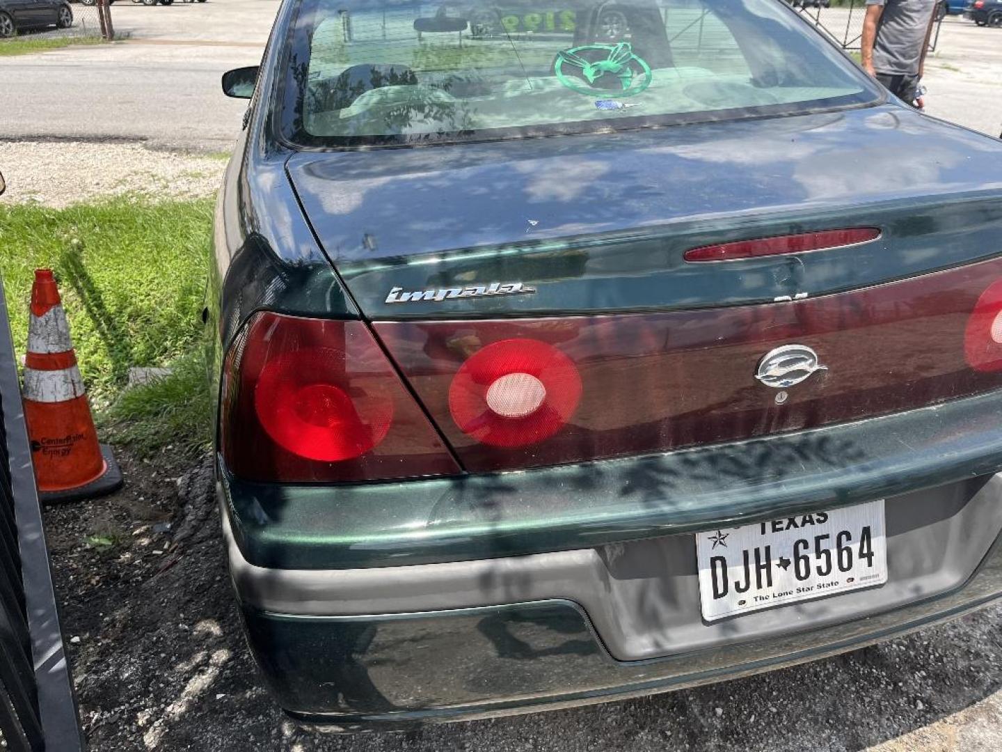 2002 GREEN CHEVROLET IMPALA Base (2G1WF52E629) with an 3.4L V6 OHV 12V engine, AUTOMATIC transmission, located at 2303 West Mt. Houston, Houston, Texas, 77038, (281) 507-3956, 29.771597, -95.339569 - Photo#2