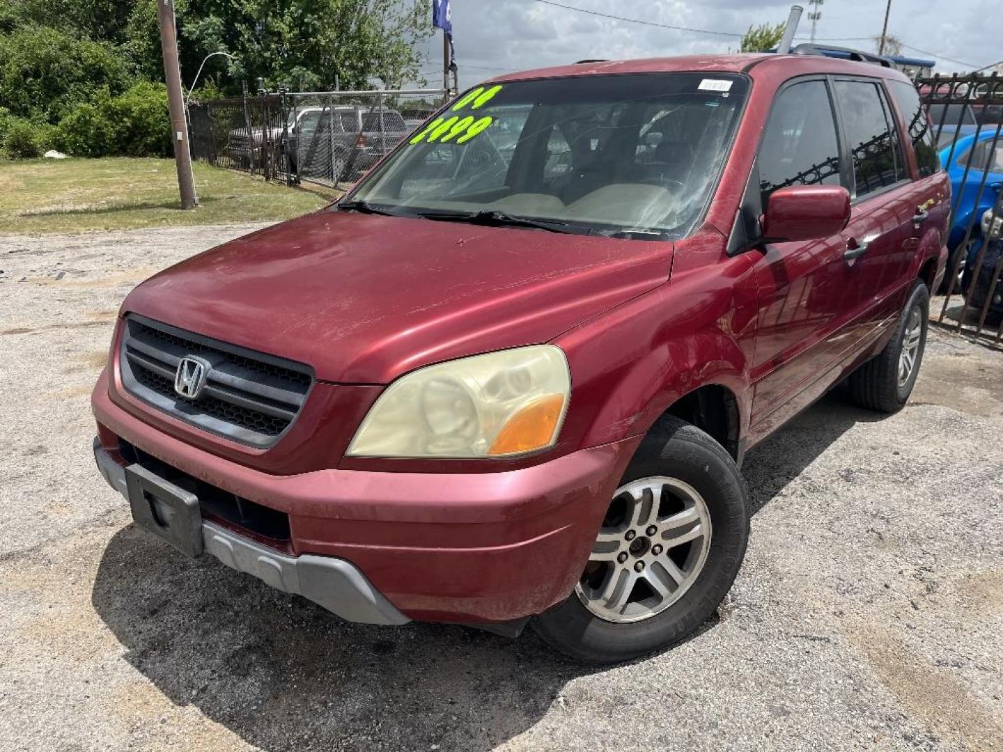 2004 RED HONDA PILOT EX w/ Leather (2HKYF18584H) with an 3.5L V6 SOHC 24V engine, AUTOMATIC transmission, located at 2303 West Mt. Houston, Houston, 77038, (281) 507-3956, 29.771597, -95.339569 - Photo#0