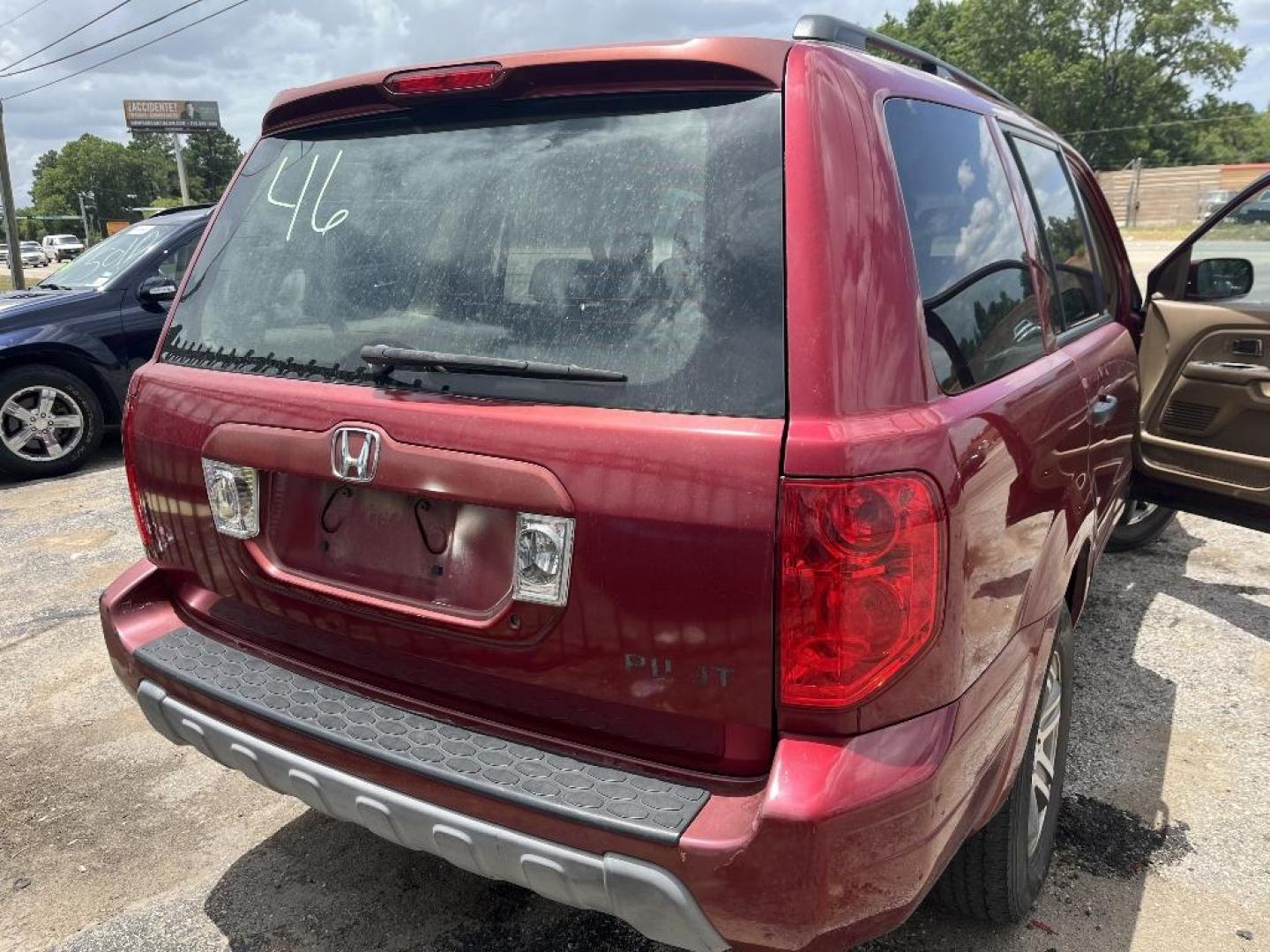 2004 RED HONDA PILOT EX w/ Leather (2HKYF18584H) with an 3.5L V6 SOHC 24V engine, AUTOMATIC transmission, located at 2303 West Mt. Houston, Houston, 77038, (281) 507-3956, 29.771597, -95.339569 - Photo#4