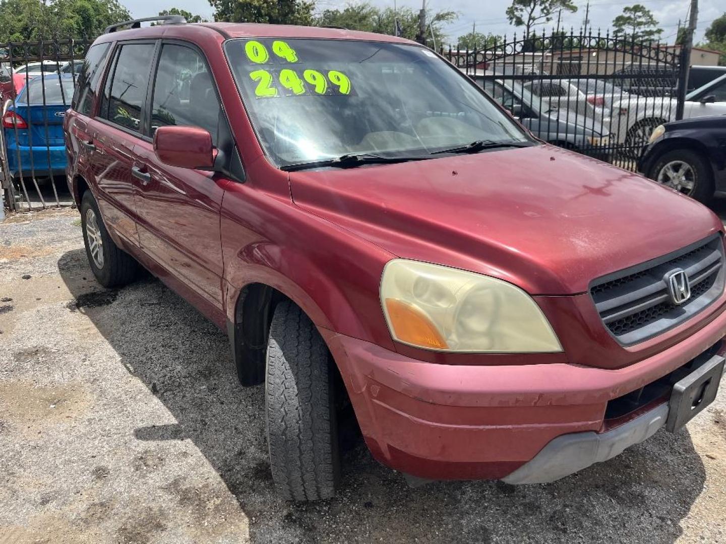 2004 RED HONDA PILOT EX w/ Leather (2HKYF18584H) with an 3.5L V6 SOHC 24V engine, AUTOMATIC transmission, located at 2303 West Mt. Houston, Houston, 77038, (281) 507-3956, 29.771597, -95.339569 - Photo#5