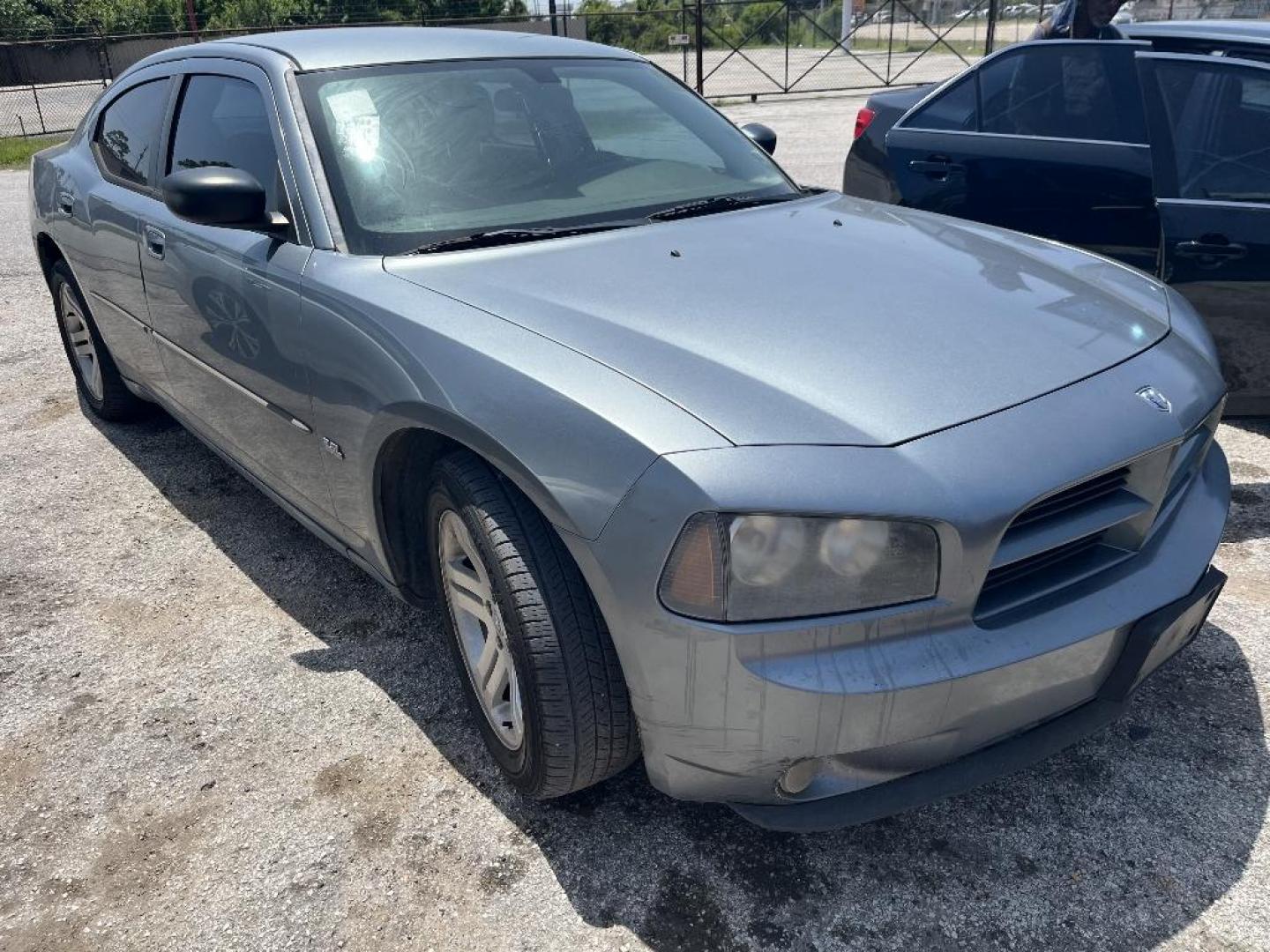 2006 BLUE DODGE CHARGER Base (2B3KA43G06H) with an 3.5L V6 SOHC 24V engine, AUTOMATIC transmission, located at 2303 West Mt. Houston, Houston, Texas, 77038, (281) 507-3956, 29.771597, -95.339569 - Photo#0