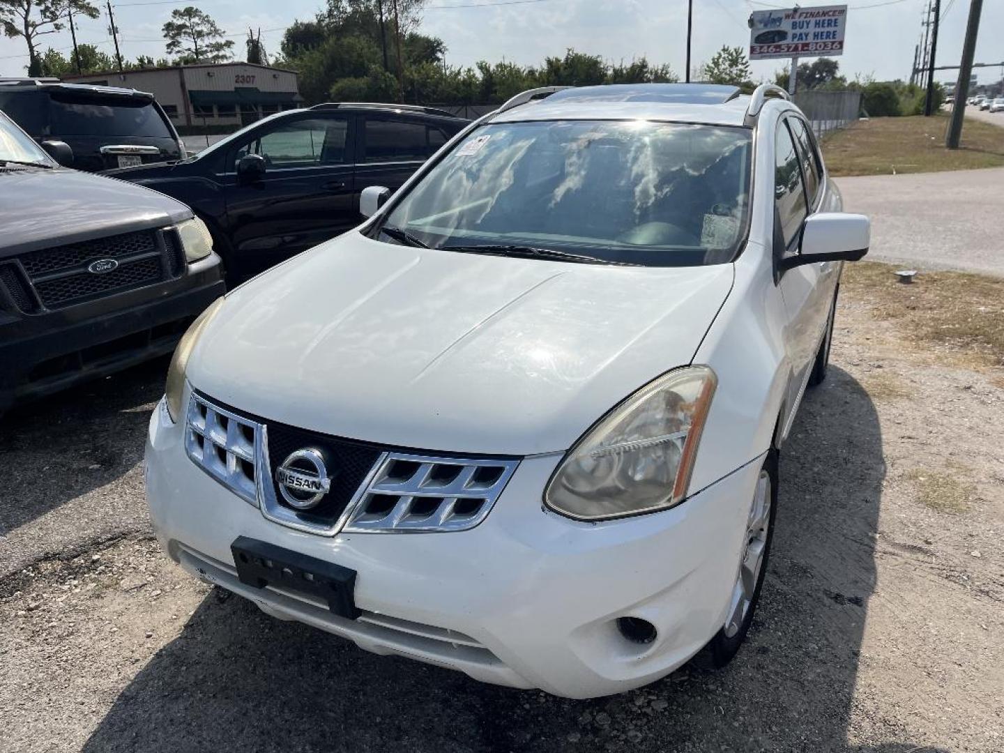 2013 WHITE NISSAN ROGUE S 2WD (JN8AS5MT9DW) with an 2.5L L4 DOHC 16V engine, AUTOMATIC transmission, located at 2303 West Mt. Houston, Houston, Texas, 77038, (281) 507-3956, 29.771597, -95.339569 - Photo#0