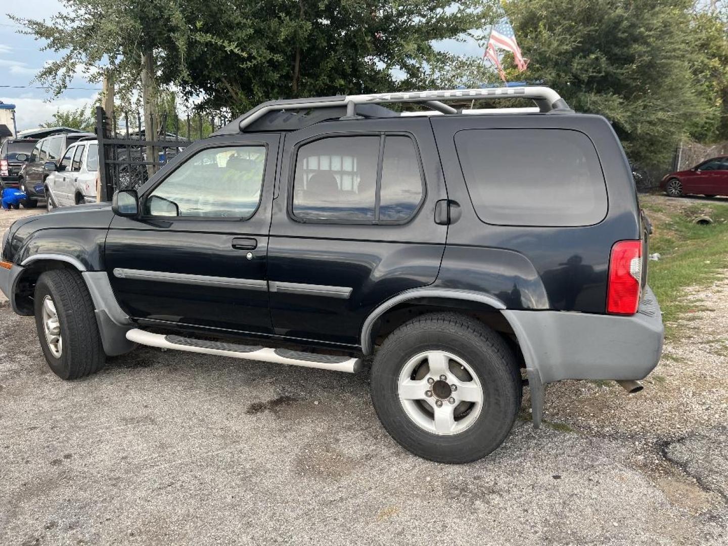 2004 BLACK NISSAN XTERRA XE 2WD (5N1ED28T44C) with an 3.3L V6 SOHC 12V engine, AUTOMATIC transmission, located at 2303 West Mt. Houston, Houston, Texas, 77038, (281) 507-3956, 29.771597, -95.339569 - Photo#2