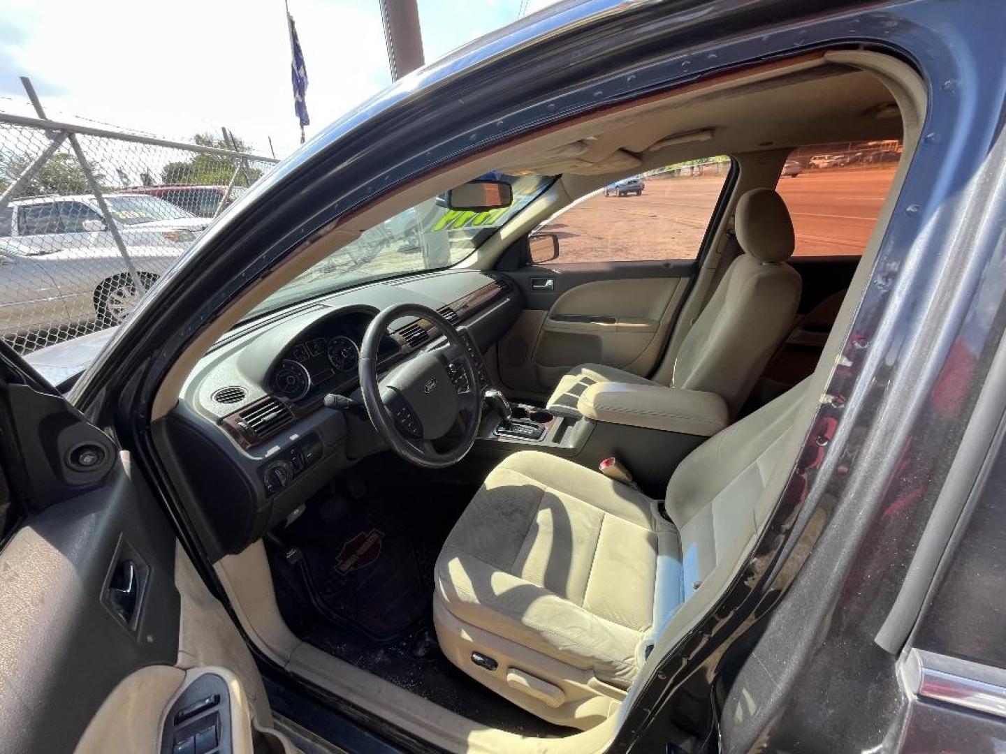 2008 BROWN FORD TAURUS SEL (1FAHP24W88G) with an 3.5L V6 DOHC 24V engine, AUTOMATIC transmission, located at 2303 West Mt. Houston, Houston, 77038, (281) 507-3956, 29.771597, -95.339569 - Photo#0