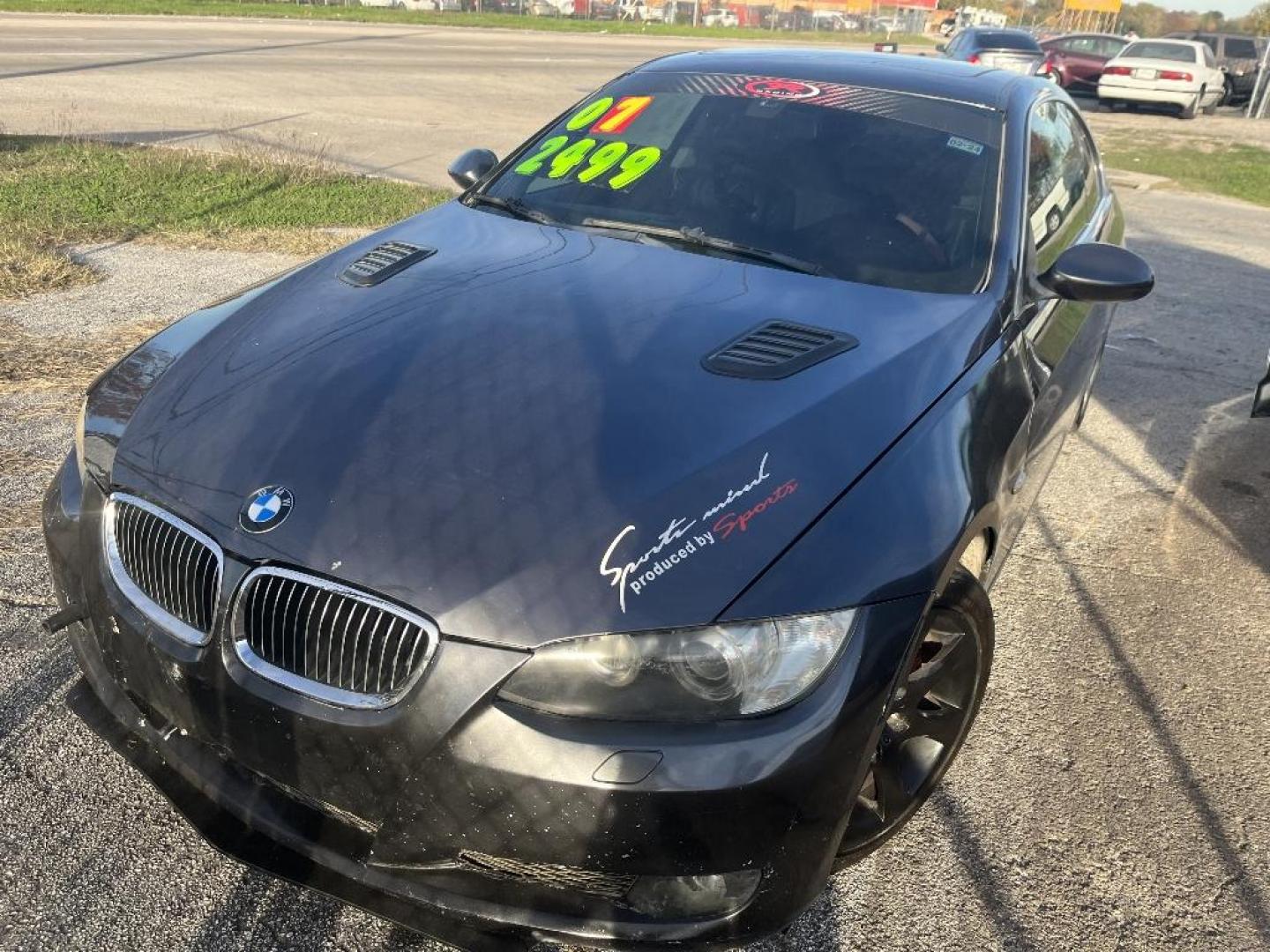 2007 BLACK BMW 3-SERIES 335i Coupe (WBAWB73517P) with an 3.0L L6 DOHC 24V engine, AUTOMATIC transmission, located at 2303 West Mt. Houston, Houston, Texas, 77038, (281) 507-3956, 29.771597, -95.339569 - Photo#0