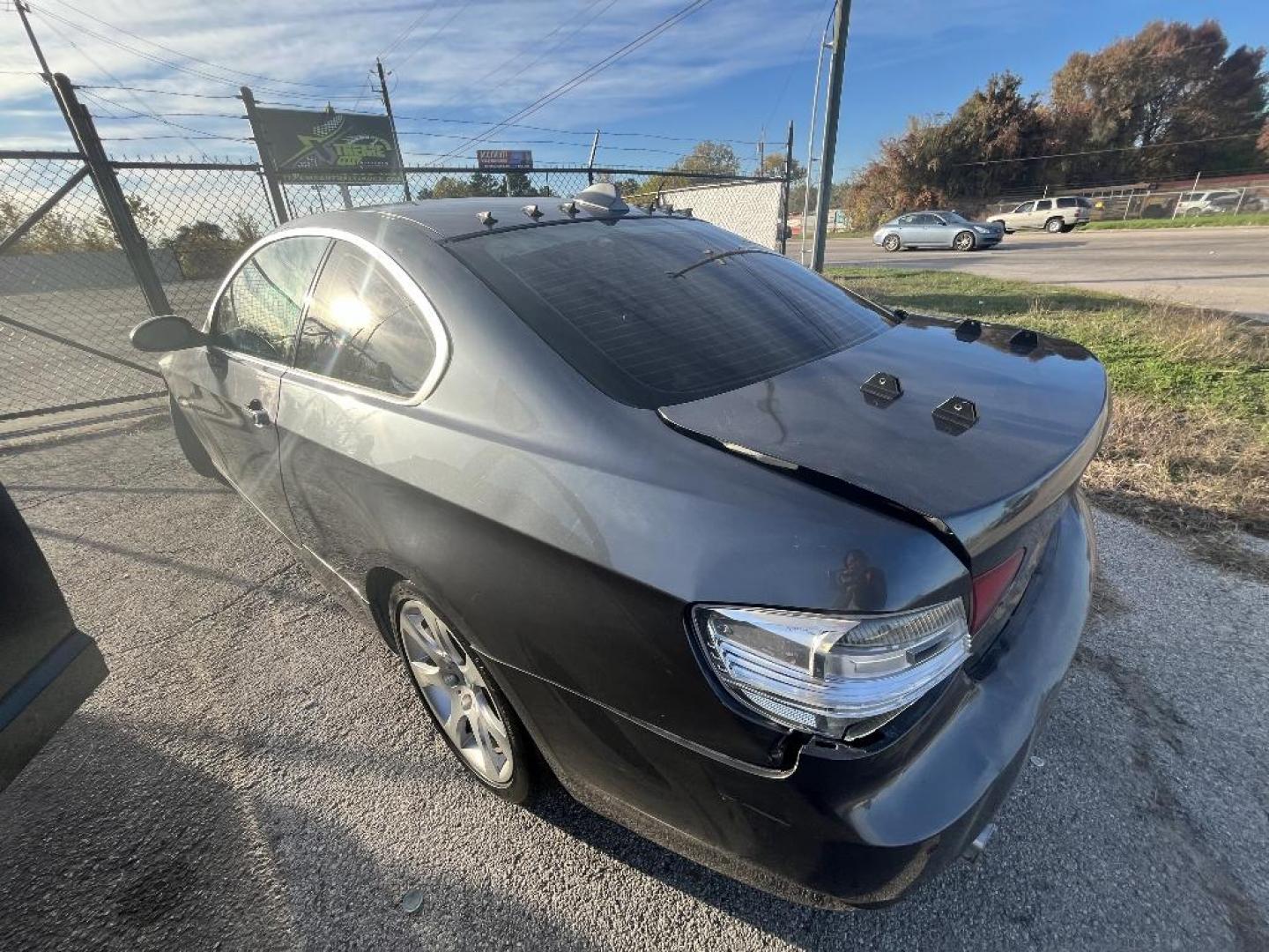 2007 BLACK BMW 3-SERIES 335i Coupe (WBAWB73517P) with an 3.0L L6 DOHC 24V engine, AUTOMATIC transmission, located at 2303 West Mt. Houston, Houston, 77038, (281) 507-3956, 29.771597, -95.339569 - Photo#2