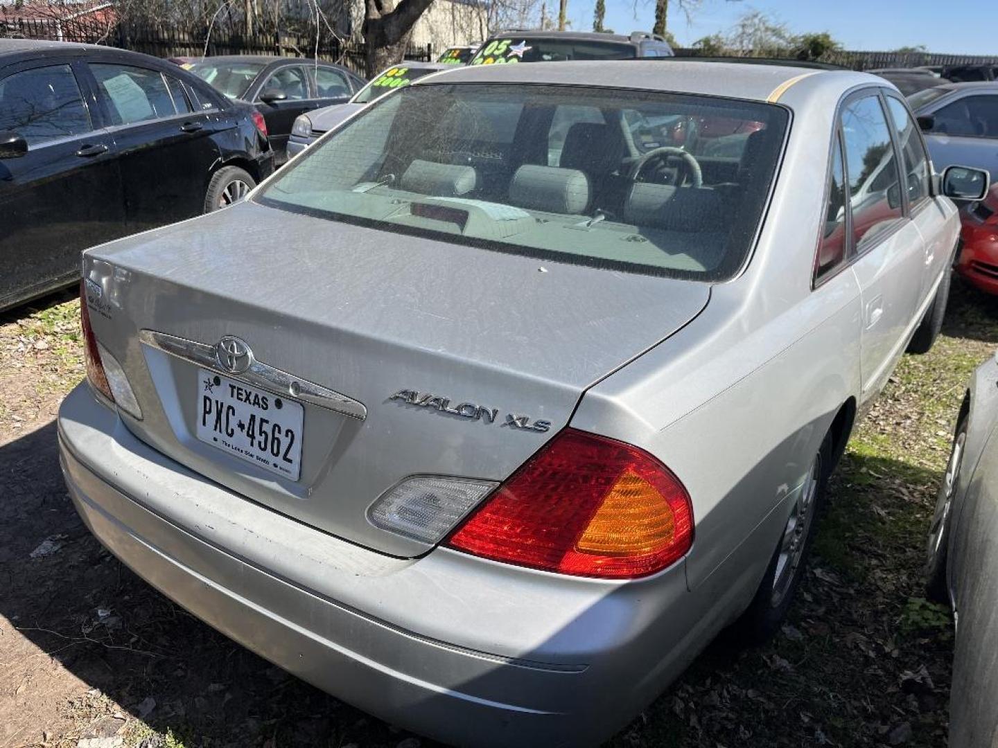 2000 BROWN TOYOTA AVALON XL (4T1BF28B2YU) with an 3.0L V6 DOHC 24V engine, AUTOMATIC transmission, located at 2303 West Mt. Houston, Houston, 77038, (281) 507-3956, 29.771597, -95.339569 - Photo#2