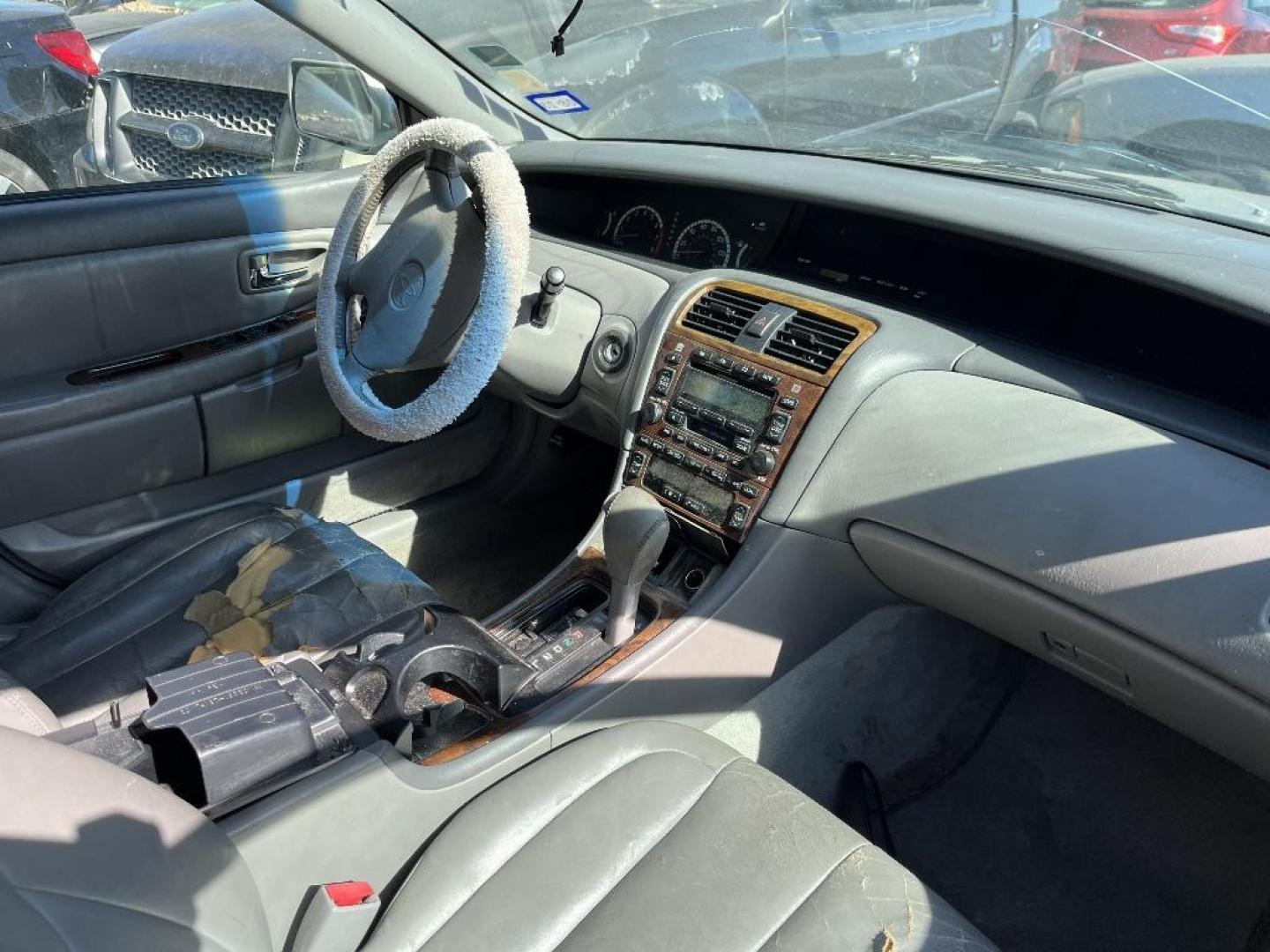 2000 BROWN TOYOTA AVALON XL (4T1BF28B2YU) with an 3.0L V6 DOHC 24V engine, AUTOMATIC transmission, located at 2303 West Mt. Houston, Houston, 77038, (281) 507-3956, 29.771597, -95.339569 - Photo#3