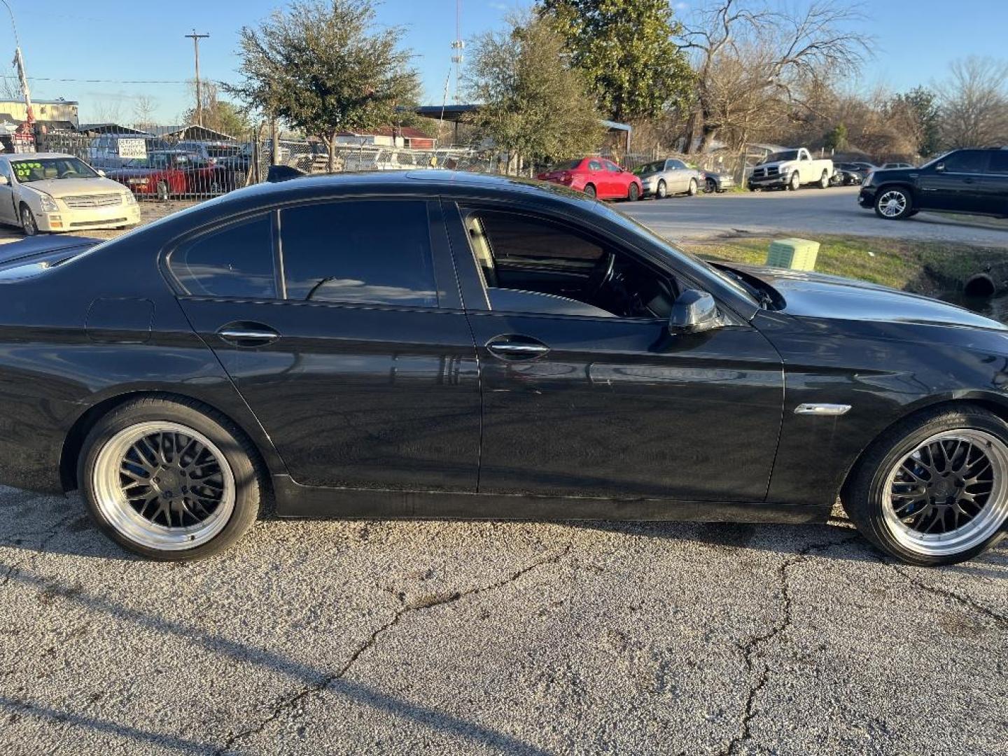 2011 BLACK BMW 5-SERIES 550i (WBAFR9C5XBC) with an 4.8L V8 DOHC 32V engine, AUTOMATIC transmission, located at 2303 West Mt. Houston, Houston, 77038, (281) 507-3956, 29.771597, -95.339569 - Photo#2