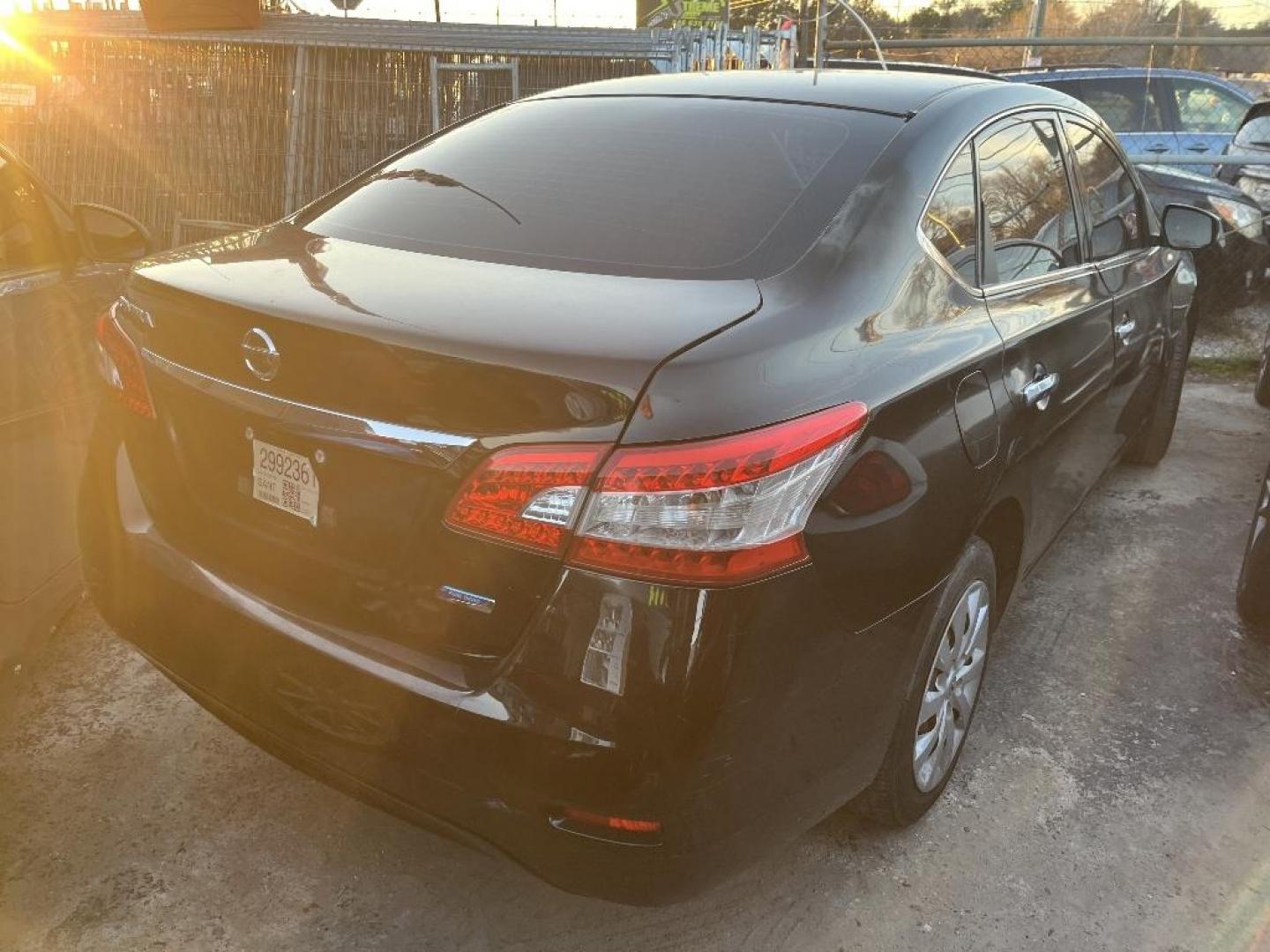 2014 BLACK NISSAN SENTRA S 6MT (3N1AB7AP6EY) with an 1.8L L4 SFI DOHC 16V engine, AUTOMATIC transmission, located at 2303 West Mt. Houston, Houston, Texas, 77038, (281) 507-3956, 29.771597, -95.339569 - Photo#1