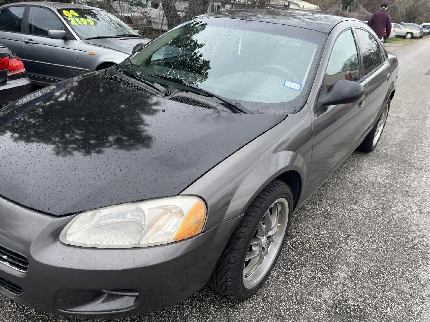 2001 BLACK DODGE STRATUS Sedan SE (1B3EJ46X71N) with an 2.4L L4 DOHC 16V engine, AUTOMATIC transmission, located at 2303 West Mt. Houston, Houston, Texas, 77038, (281) 507-3956, 29.771597, -95.339569 - Photo#0