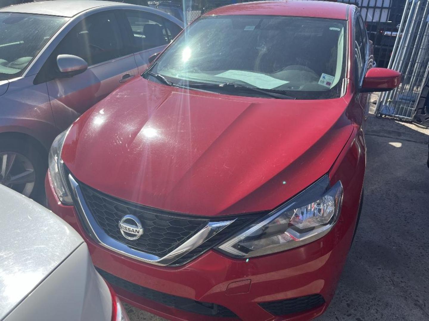 2018 RED NISSAN SENTRA S 6MT (3N1AB7AP1JY) with an 1.8L L4 SFI DOHC 16V engine, AUTOMATIC transmission, located at 2303 West Mt. Houston, Houston, Texas, 77038, (281) 507-3956, 29.771597, -95.339569 - Photo#0