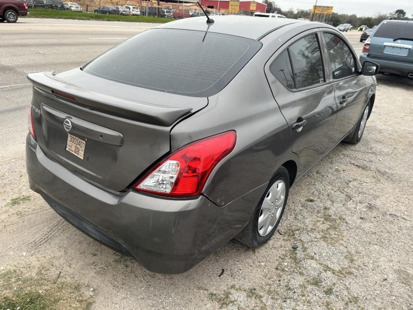 2017 BROWN NISSAN VERSA 1.6 S 5M (3N1CN7AP5HL) with an 1.6L L4 DOHC 16V engine, AUTOMATIC transmission, located at 2303 West Mt. Houston, Houston, Texas, 77038, (281) 507-3956, 29.771597, -95.339569 - Photo#1