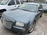 2005 GRAY CHRYSLER 300 Touring (2C3JA53G45H) with an 3.5L V6 DOHC 24V engine, AUTOMATIC transmission, located at 2303 West Mt. Houston, Houston, Texas, 77038, (281) 507-3956, 29.771597, -95.339569 - Photo#0