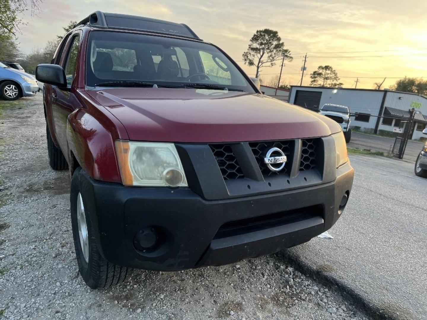 2007 RED NISSAN XTERRA S 2WD (5N1AN08U97C) with an 4.0L V6 DOHC 24V engine, AUTOMATIC transmission, located at 2303 West Mt. Houston, Houston, Texas, 77038, (281) 507-3956, 29.771597, -95.339569 - Photo#0