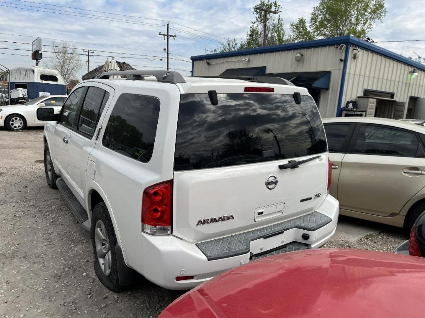 2010 WHITE NISSAN ARMADA SE 2WD (5N1BA0NDXAN) with an 5.6L V8 DOHC 32V FFV engine, AUTOMATIC transmission, located at 2303 West Mt. Houston, Houston, Texas, 77038, (281) 507-3956, 29.771597, -95.339569 - Photo#3