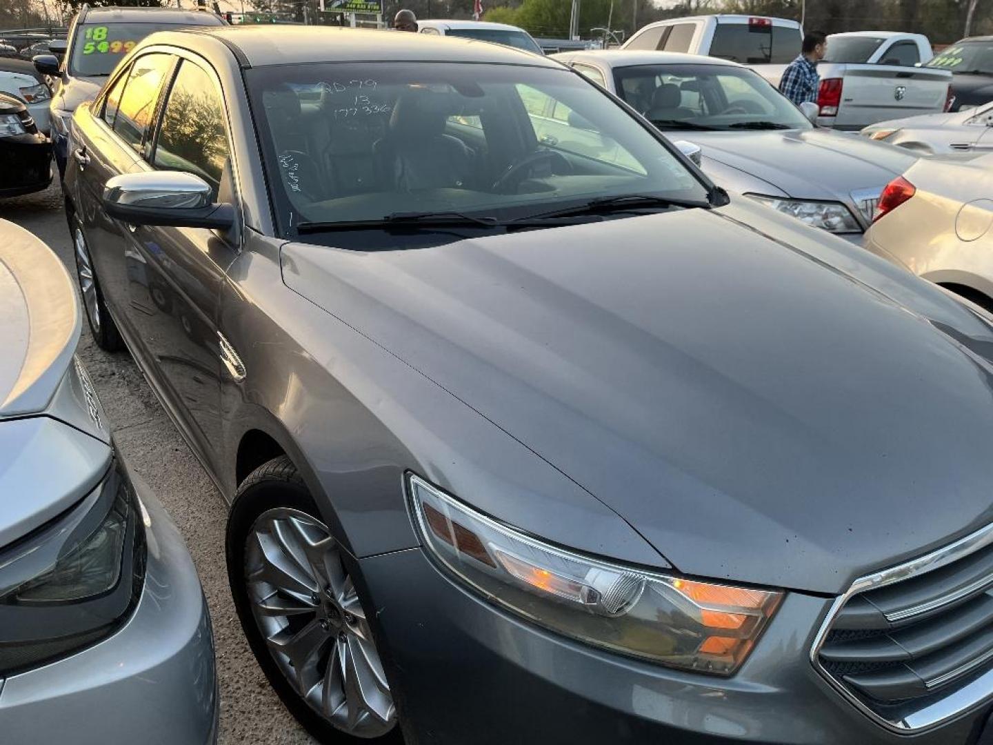 2013 BLACK FORD TAURUS Limited FWD (1FAHP2F85DG) with an 3.5L V6 DOHC 24V engine, AUTOMATIC transmission, located at 2303 West Mt. Houston, Houston, 77038, (281) 507-3956, 29.771597, -95.339569 - Photo#1