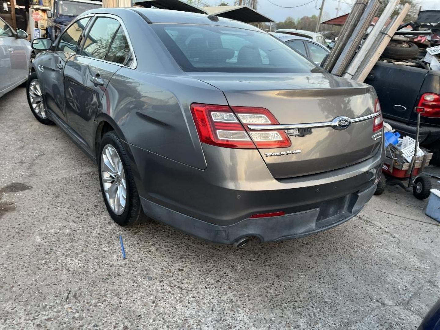 2013 BLACK FORD TAURUS Limited FWD (1FAHP2F85DG) with an 3.5L V6 DOHC 24V engine, AUTOMATIC transmission, located at 2303 West Mt. Houston, Houston, 77038, (281) 507-3956, 29.771597, -95.339569 - Photo#4