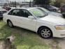 2001 WHITE TOYOTA AVALON XL (4T1BF28B51U) with an 3.0L V6 DOHC 24V engine, AUTOMATIC transmission, located at 2303 West Mt. Houston, Houston, 77038, (281) 507-3956, 29.771597, -95.339569 - Photo#3